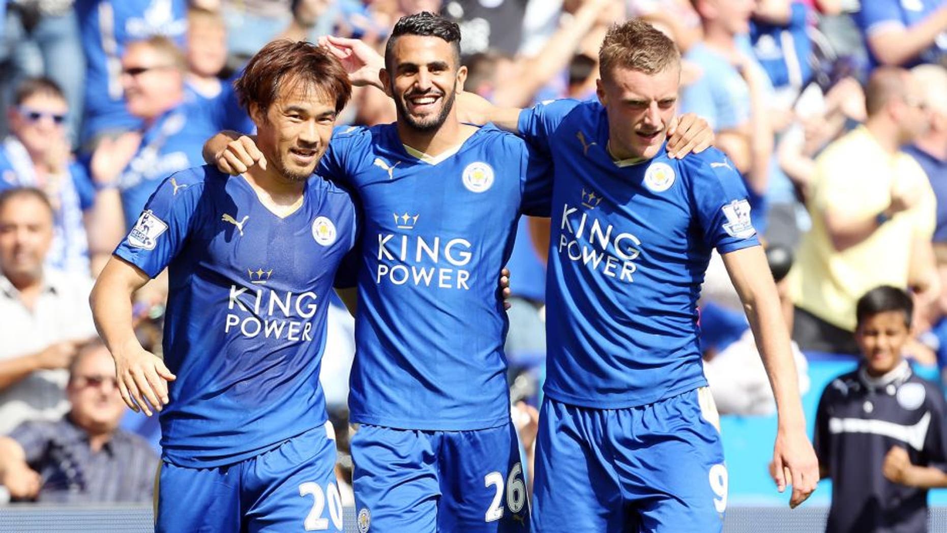 LEICESTER, ENGLAND - AUGUST 08: GOAL Riyad Mahrez of Leicester City celebrates with Jamie Vardy and Shinji Okazaki of Leicester City after scoring to make it 2-0 during the Barclays Premier League match between Leicester City and Sunderland at the King Power Stadium on August 08, 2015 in Leicester, England. (Photo by Plumb Images/Leicester City FC via Getty Images)
