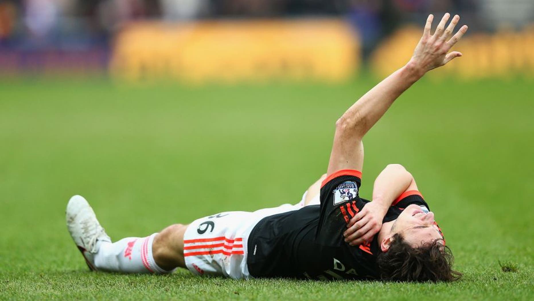SUNDERLAND, ENGLAND - FEBRUARY 13: Matteo Darmian of Manchester United lies injured during the Barclays Premier League match between Sunderland and Manchester United at the Stadium of Light on February 13, 2016 in Sunderland, England. (Photo by Clive Brunskill/Getty Images)
