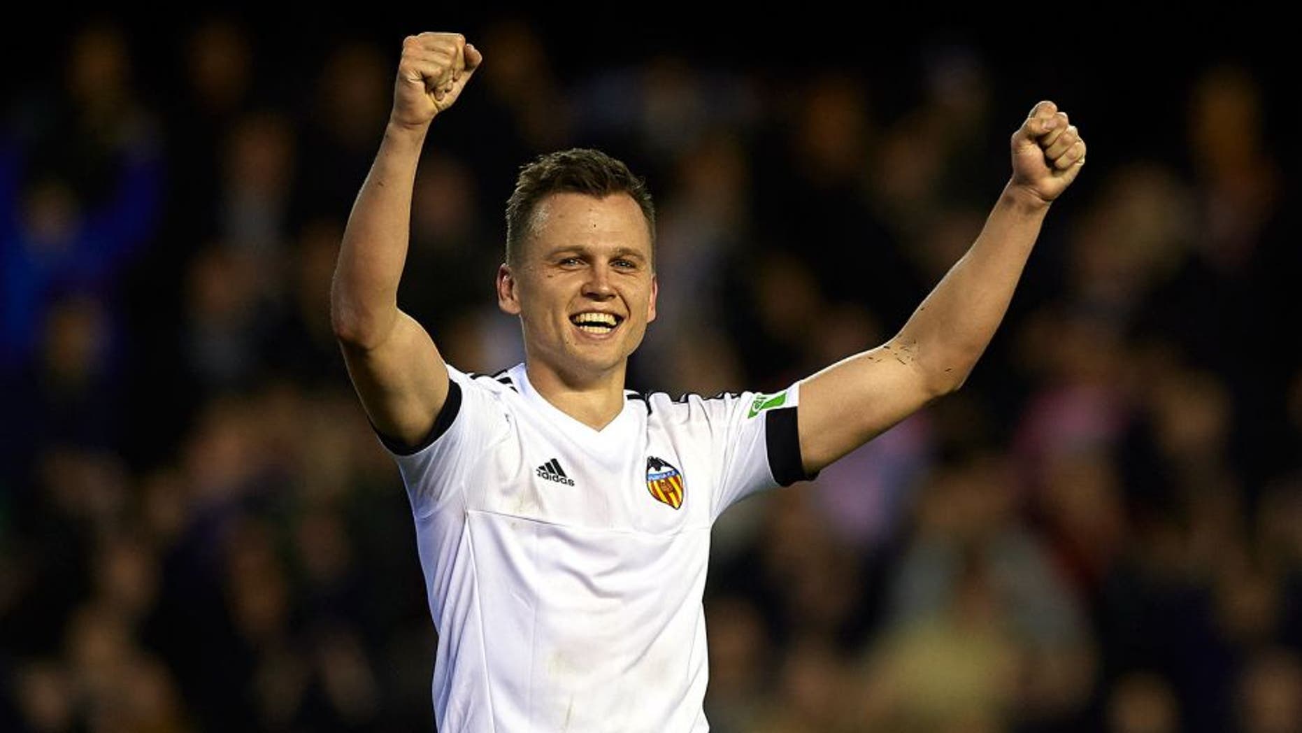 VALENCIA, SPAIN - FEBRUARY 13: Denis Cheryshev of Valencia celebrates scoring his team's second goal during the La Liga match between Valencia CF and RCD Espanyol at Estadi de Mestalla on February 13, 2016 in Valencia, Spain. (Photo by Manuel Queimadelos Alonso/Getty Images)