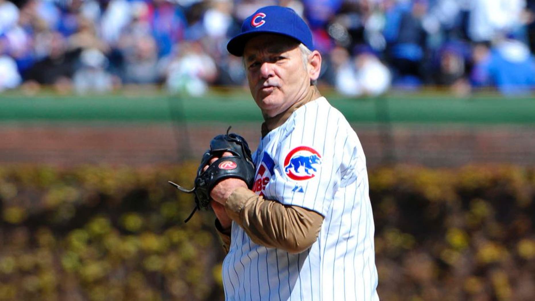 April 5, 2012; Chicago, IL, USA; Movie actor Bill Murray throws out the ceremonial first pitch before the game between the Chicago Cubs and the Washington Nationals on opening day at Wrigley Field. Mandatory Credit: Rob Grabowski-USA TODAY Sports