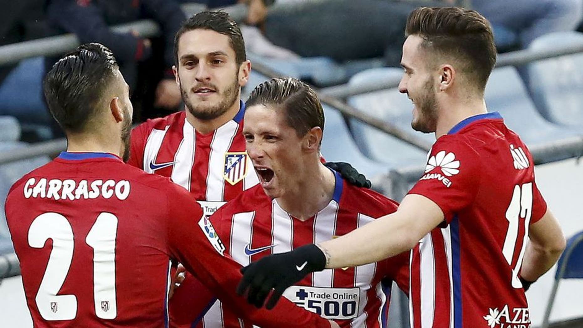 Football Soccer - Getafe v Atletico Madrid - Spanish Liga BBVA - Coliseum Alfonso Perez stadium, Madrid, Spain - 14/02/16 Atletico Madrid players celebrate Fernando Torres' goal. REUTERS/Andrea Comas Picture Supplied by Action Images
