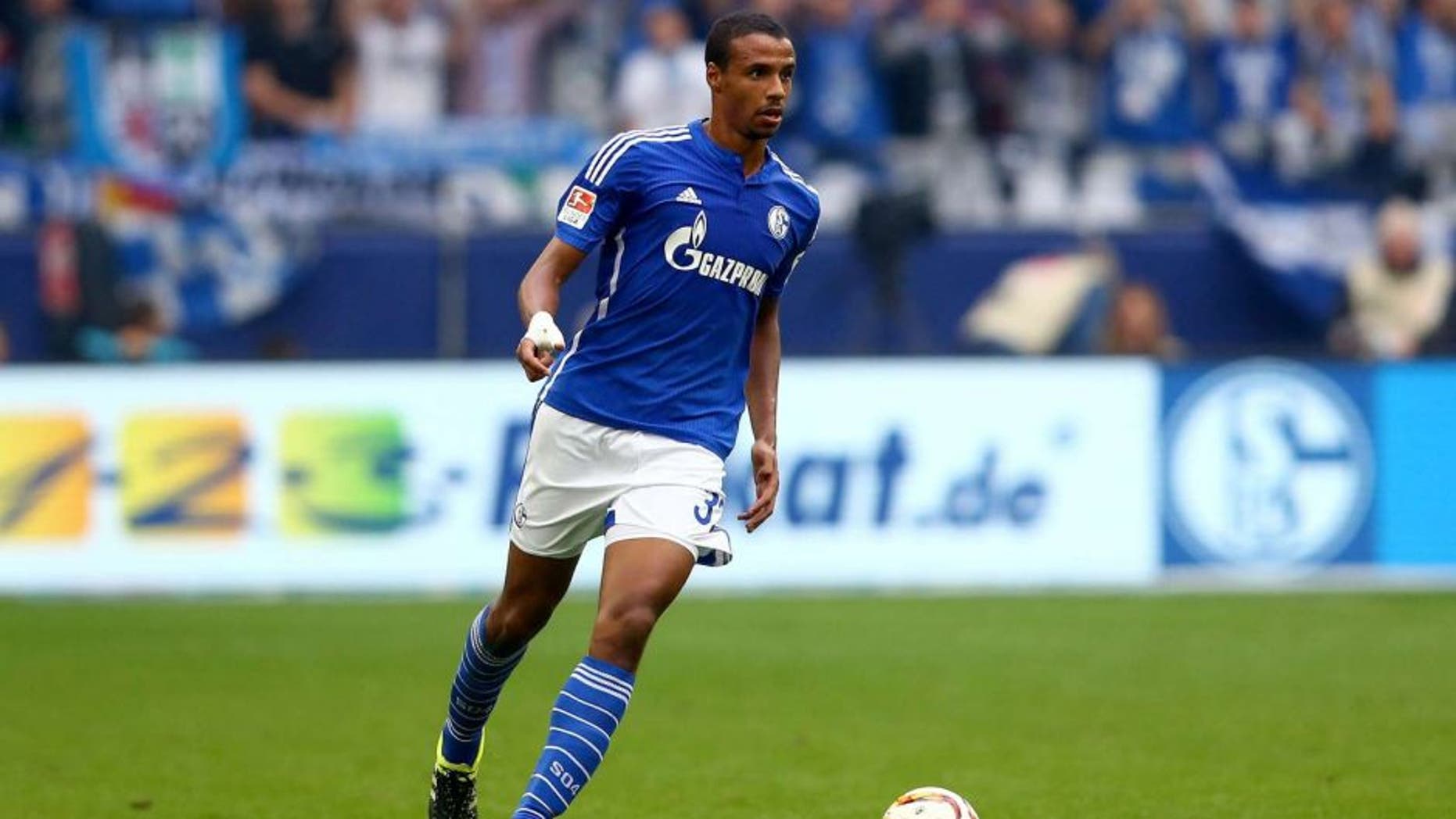 GELSENKIRCHEN, GERMANY - OCTOBER 04: Joel Matip of Schalke runs with the ball during the Bundesliga match between FC Schalke 04 and 1. FC Koeln at Veltins-Arena on October 4, 2015 in Gelsenkirchen, Germany. (Photo by Christof Koepsel/Bongarts/Getty Images)