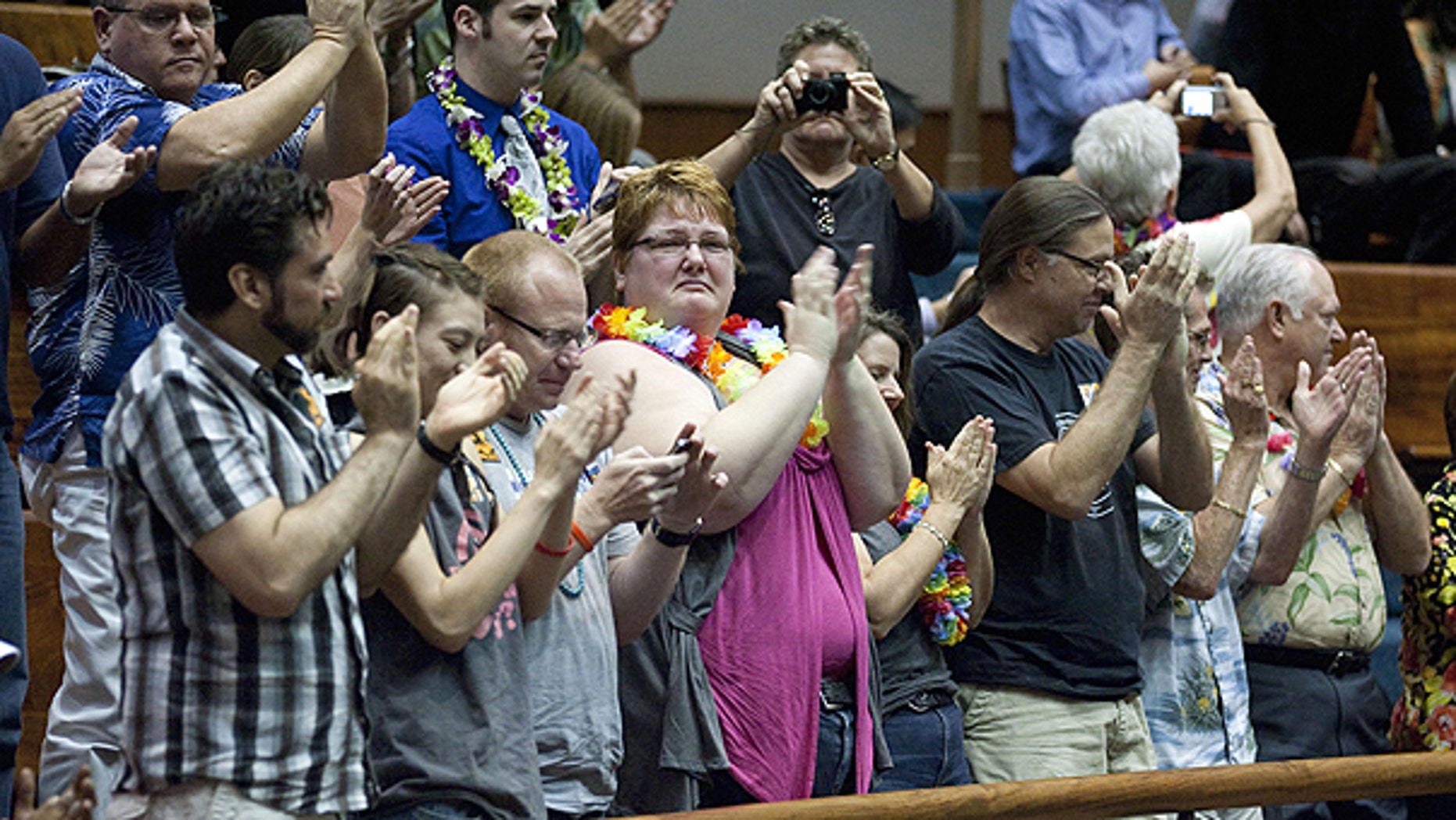 Feb. 16: Supports of the Hawaii Civil Unions Bill applaud, celebrating the Hawaii Senate's vote 18-5 to approve the Civil Unions bill at the State Capitol in Honolulu, Hawaii.