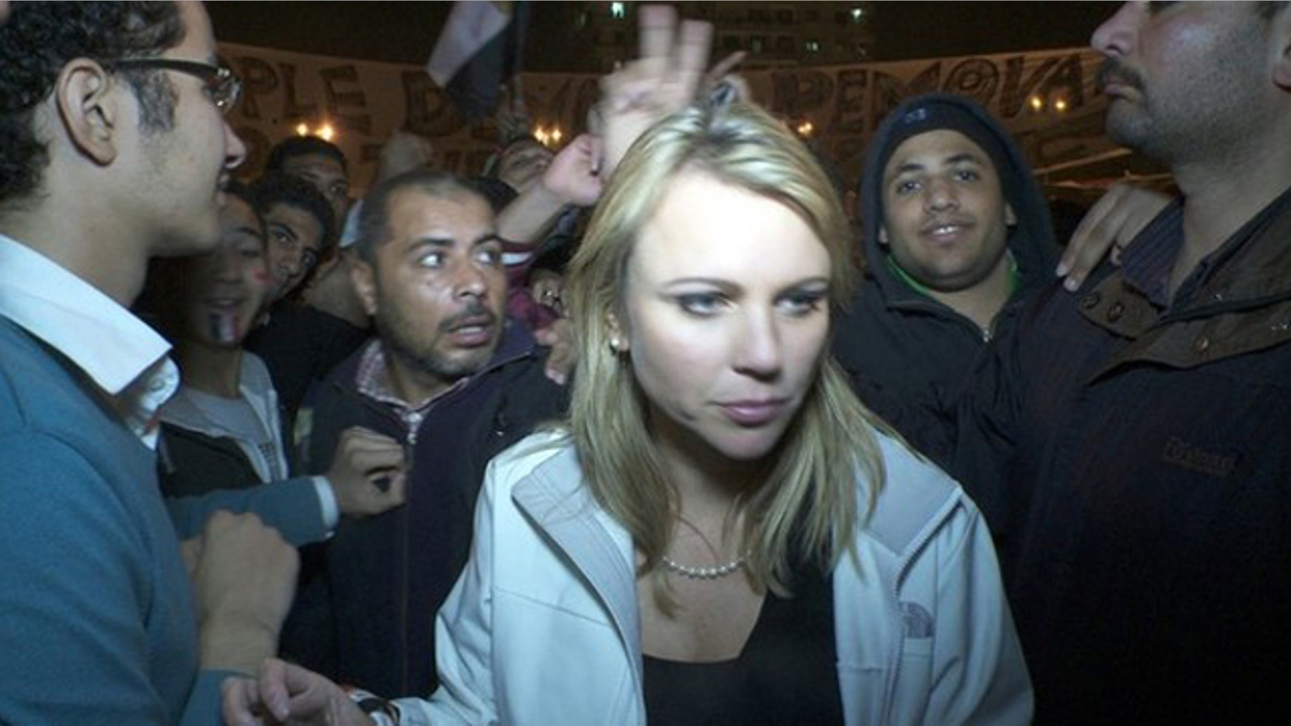 Feb. 11: CBS Correspondent Lara Logan is pictured in Cairo's Tahrir Square moments before she was assaulted.