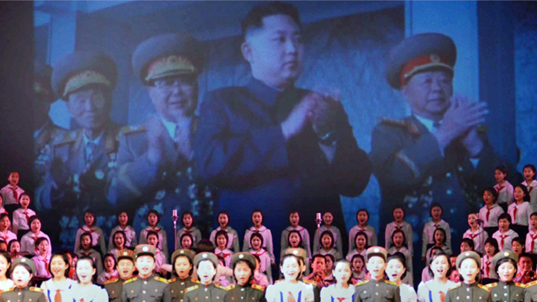 Feb. 16: An image of North Korea's heir apparent Kim Jong Un, center, is shown on the screen during a performance to celebrate the 69th birthday of their leader, Kim Jong Il, in the North Korean capital of Pyongyang.