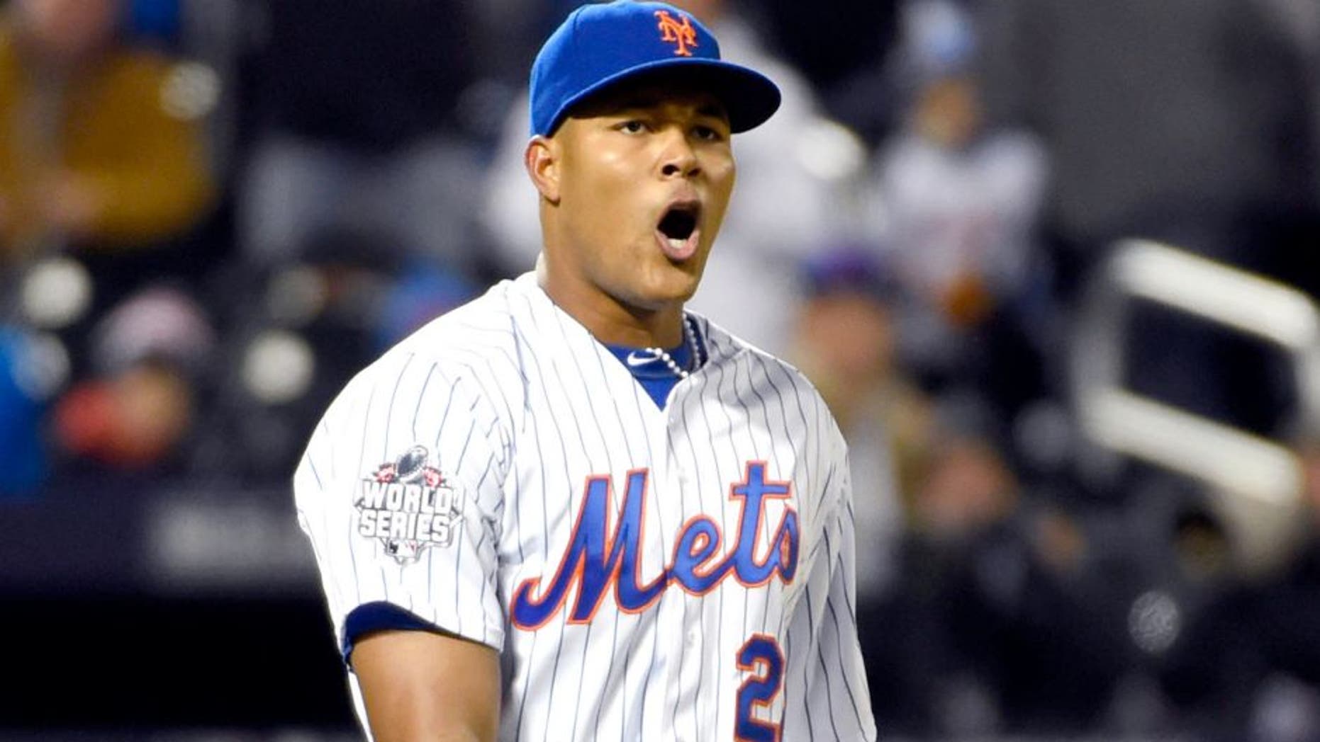 Oct 30, 2015; New York City, NY, USA; New York Mets relief pitcher Jeurys Familia (27) reacts after defeating the Kansas City Royals in game three of the World Series at Citi Field. Mandatory Credit: Robert Deutsch-USA TODAY Sports