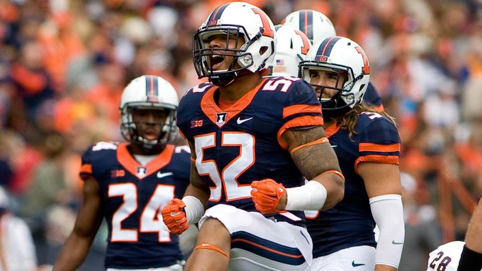 Sep 12, 2015; Champaign, IL, USA; Illinois Fighting Illini linebacker T.J. Neal (52) celebrates a sack against the Western Illinois Leathernecks at Memorial Stadium. Mandatory Credit: Mike Granse-USA TODAY Sports
