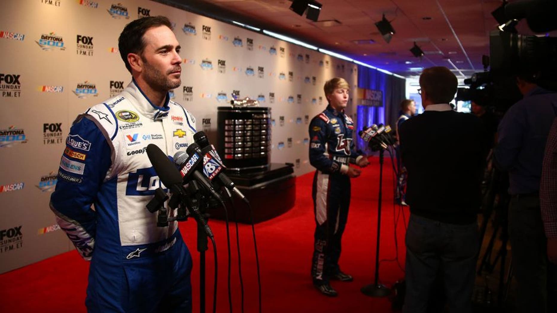 DAYTONA BEACH, FL - FEBRUARY 16: NASCAR Sprint Cup Series driver Jimmie Johnson speaks to the media during NASCAR Media Day at Daytona International Speedway on February 16, 2016 in Daytona Beach, Florida. (Photo by Sarah Crabill/NASCAR via Getty Images)