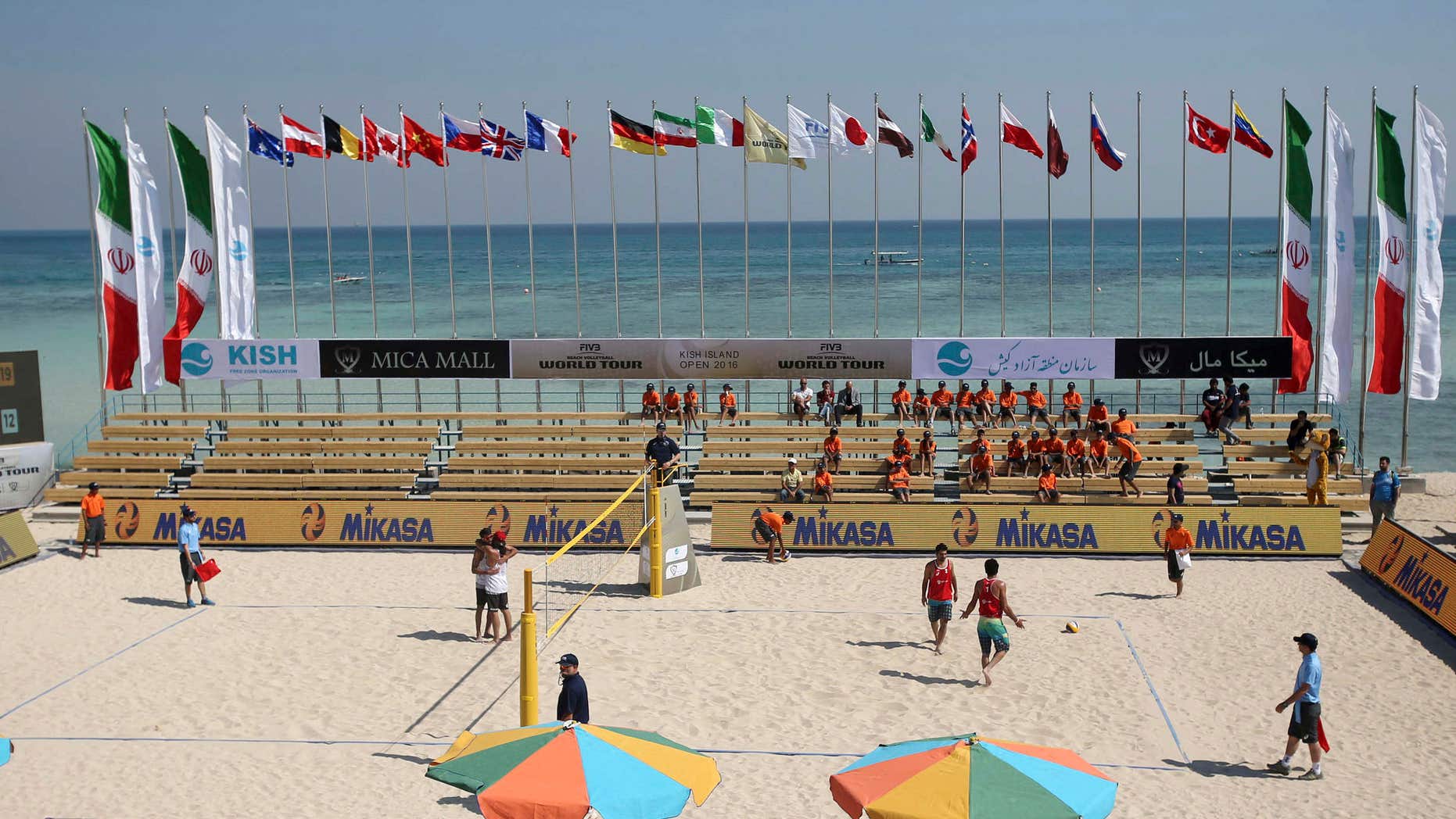 This picture made available by Tasnim News Agency and taken on Monday, Feb. 15, 2016, shows a volleyball match between Iran and Turkey during Beach Volleyball World Tour in the Iranian Kish island in the Persian Gulf.