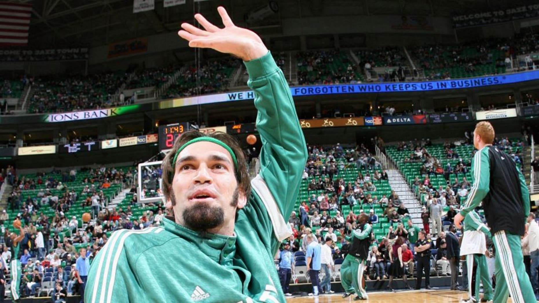SALT LAKE CITY, UT - DECEMBER 29: Scot Pollard #66 of the Boston Celtics stretches on the court prior to the game against the Utah Jazz at the Energy Solutions Arena on December 29, 2007 in Salt Lake City, Utah. The Celtics won 104-98. NOTE TO USER: User expressly acknowledges and agrees that, by downloading and or using this Photograph, user is consenting to the terms and conditions of the Getty Images License Agreement. Mandatory Copyright Note: Copyright 2007 NBAE (Photo by Melissa Majchrzak/NBAE via Getty Images)