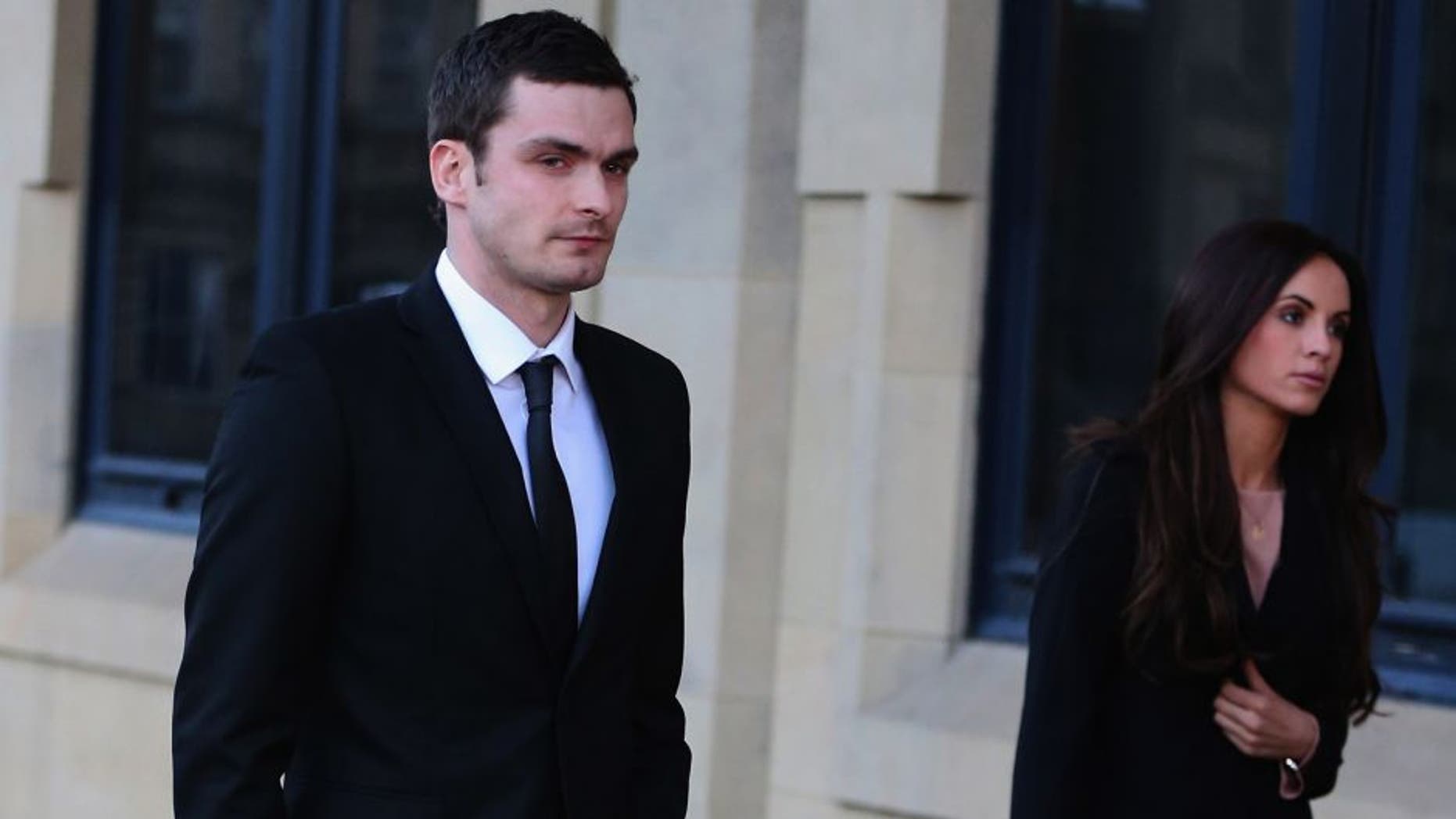 BRADFORD, ENGLAND - FEBRUARY 10: Adam Johnson with girlfriend Stacey Flounders leaving Crown Court after admitting two charges against him and pleading not guilty to two others on February 10, 2016 in Bradford, England. The Sunderland FC midfielder, aged 28 and from Castle Eden, County Durham, will go on trial for two counts of sexual activity having pleaded guilty to two others. He has one daughter. (Photo by Nigel Roddis/Getty Images)