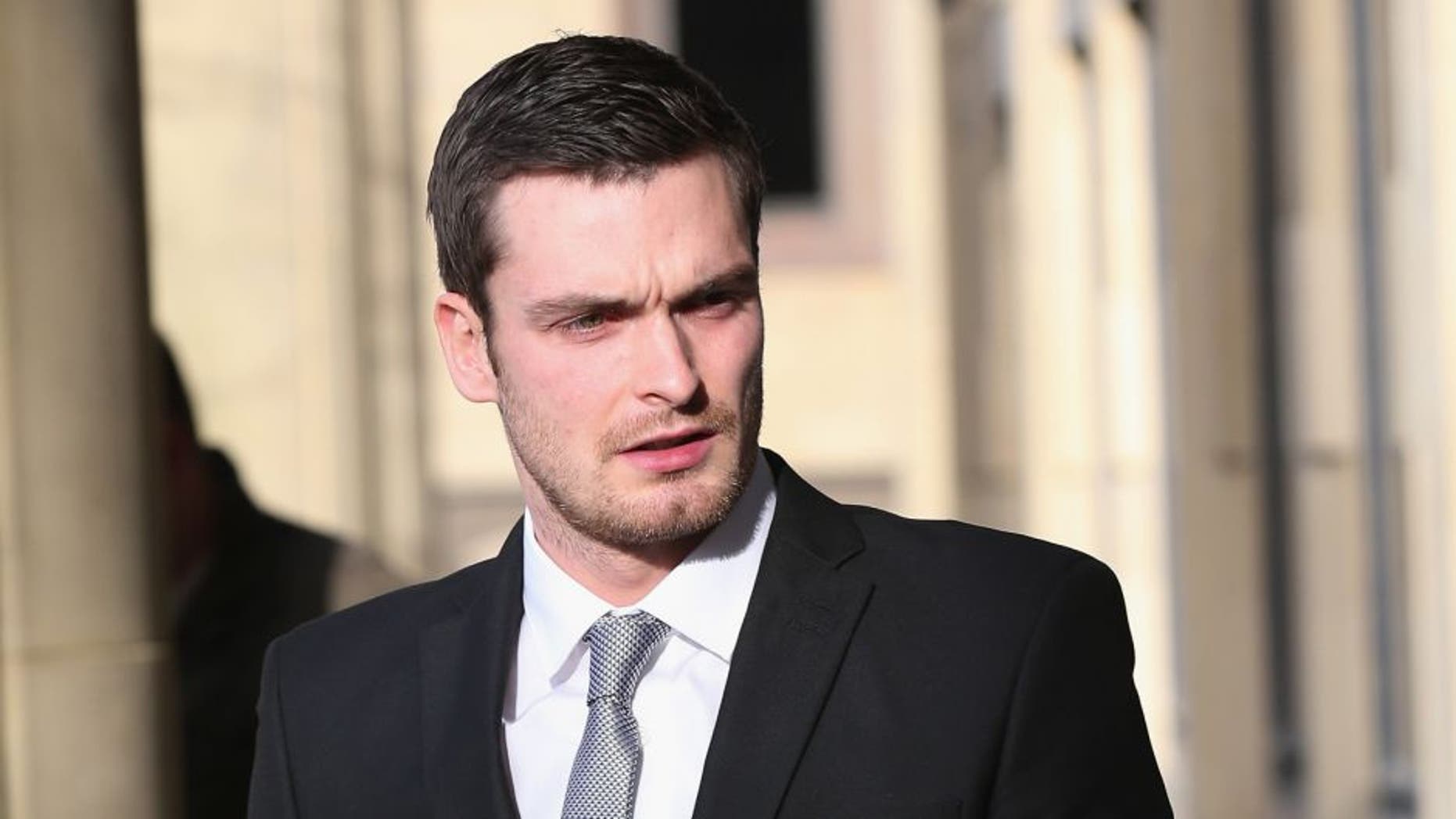BRADFORD, ENGLAND - FEBRUARY 16: Adam Johnson arrives at Bradford Crown Court for day three of the trial where Johnson is facing child sexul assault charges on February 16, 2016 in Bradford, England. The former Sunderland FC midfielder, aged 28 and from Castle Eden, County Durham, is on trial for two counts of sexual activity having pleaded guilty to two others. (Photo by Christopher Furlong/Getty Images)