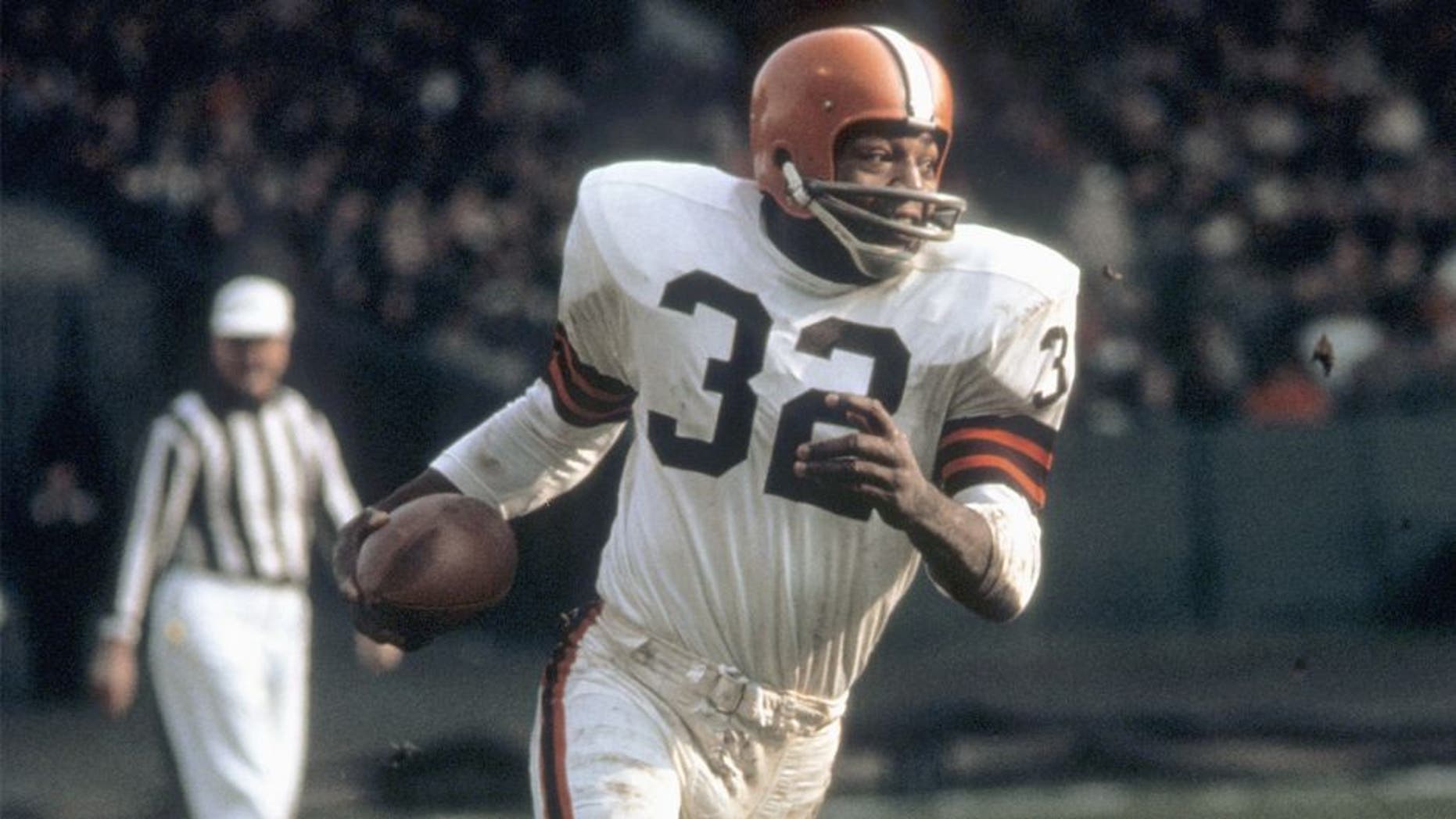 CLEVELAND, OH - 1960: Runningback Jim Brown #32 of the Cleveland Browns runs with the ball during a game in the 1960's at Municipal Stadium in Cleveland, Ohio. (Photo by: Tony Tomsic/Getty Images)