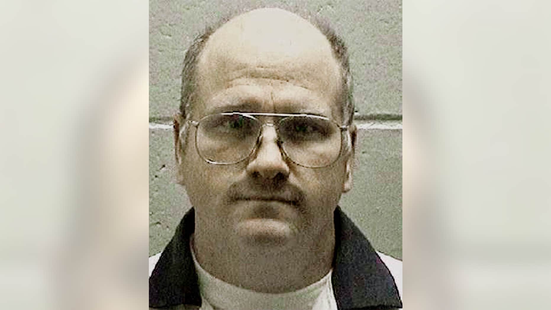 FILE -In this undated file photo released by the Georgia Department of Corrections shows death row inmate and former U.S. Navy sailor Travis Hittson in Georgia. Hittson, 45, is to scheduled be put to death Wednesday evening, Feb. 17, 2016.