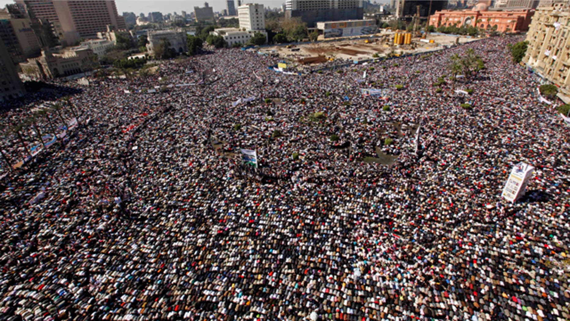 Feb. 18: Thousands pray during Friday prayers at Tahrir square in Cairo, Egypt.