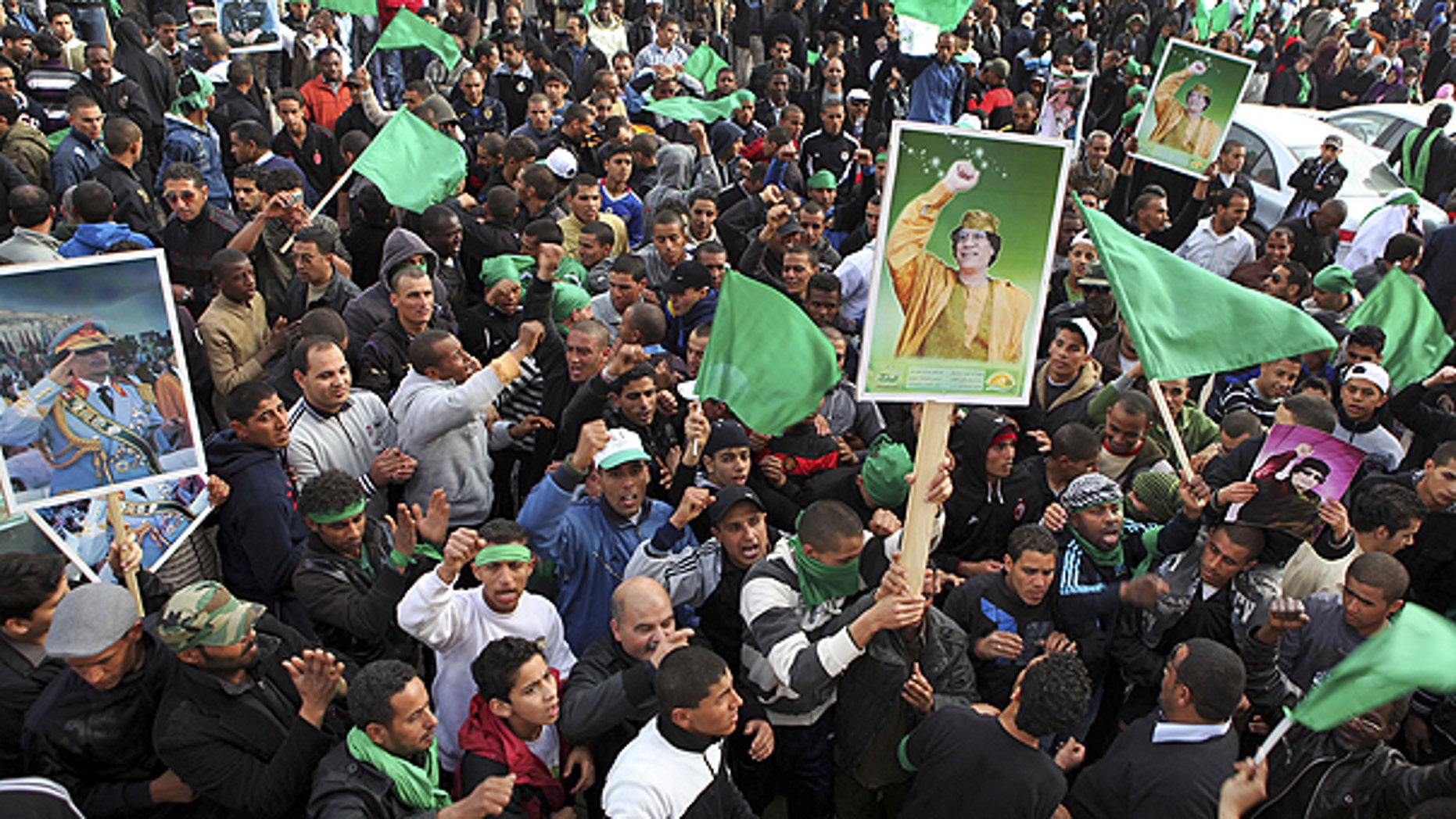 Feb. 18: Pro-Qaddafi supporters gather in Green Square after traditional Friday prayers in Tripoli, Libya.