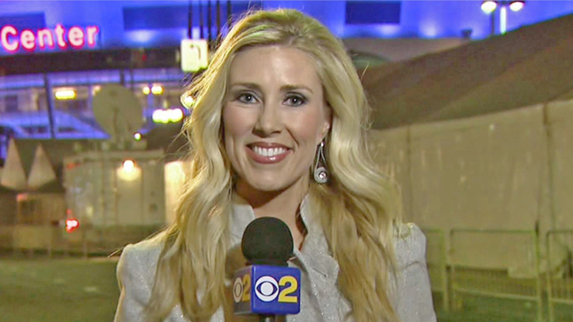 In this Feb. 13 handout file photo provided by KCBS in Los Angeles, veteran TV journalist Serene Branson reports on the Grammy awards show outside the Staples Center in Los Angeles.