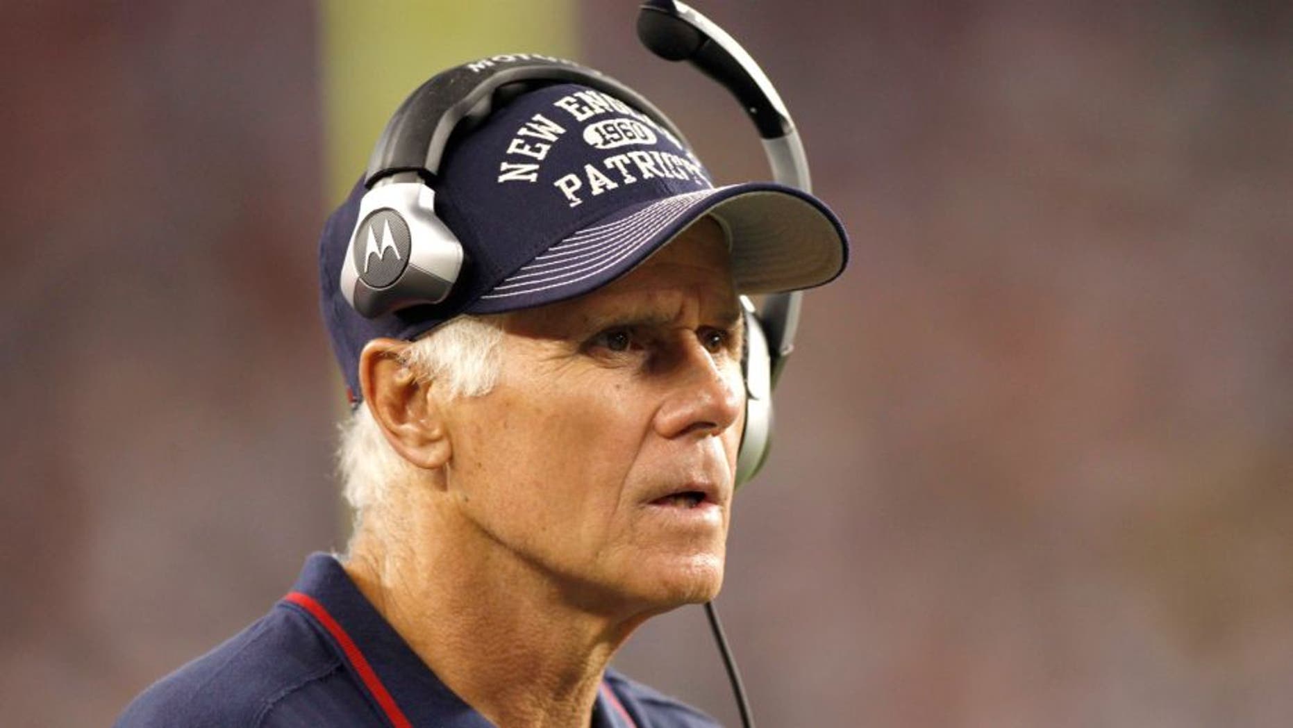 October 9, 2011; Foxboro, Massachusetts, USA; New England Patriots offensive line coach Dante Scarnecchia on the side line during the third quarter against the New York Jets at Gillette Stadium. Mandatory Credit: Greg M. Cooper-USA TODAY Sports