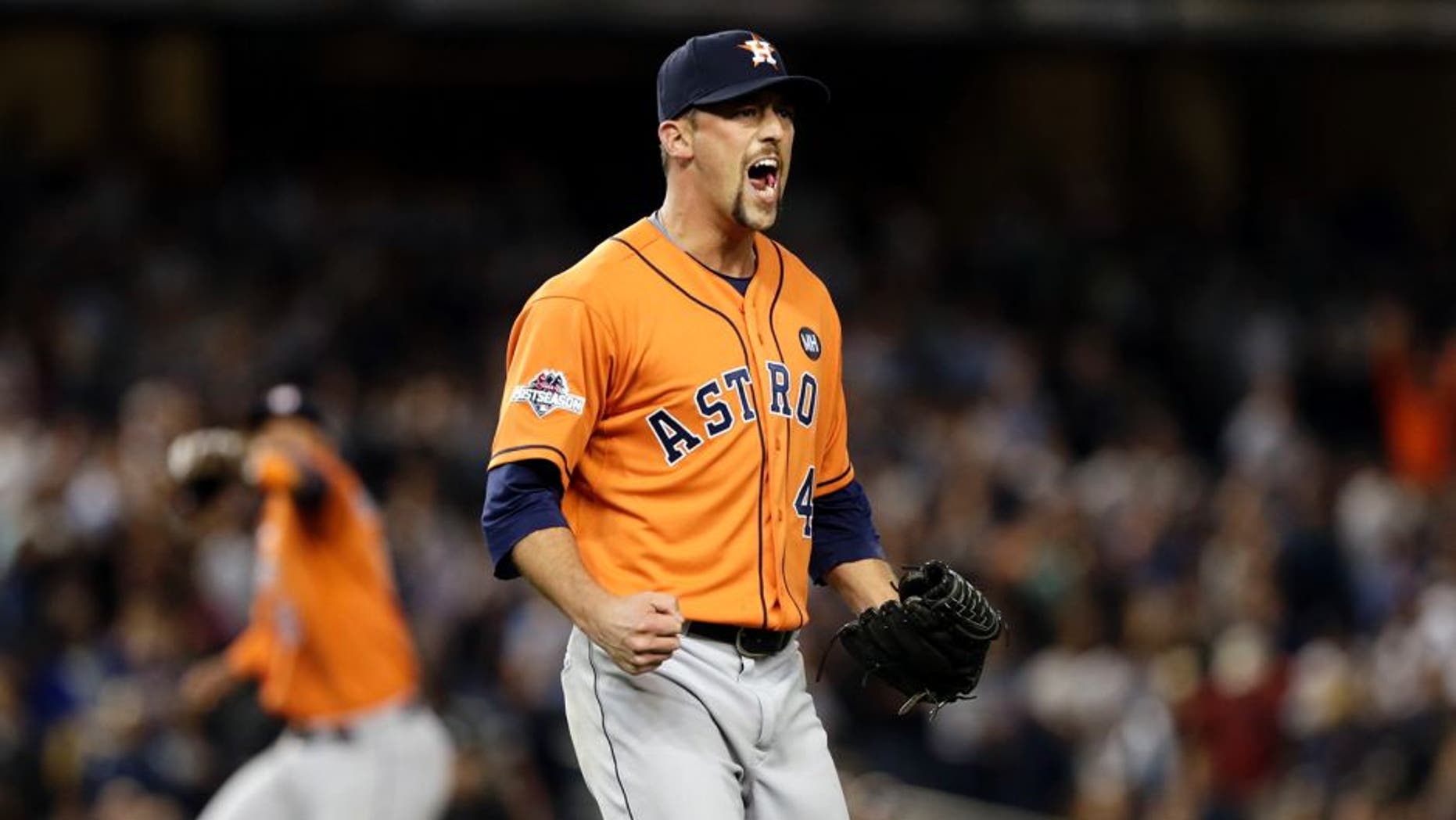 Oct 6, 2015; Bronx, NY, USA; Houston Astros relief pitcher Luke Gregerson (44) reacts after closing out the ninth inning against the New York Yankees in the American League Wild Card playoff baseball game at Yankee Stadium. Houston won 3-0. Mandatory Credit: Adam Hunger-USA TODAY Sports