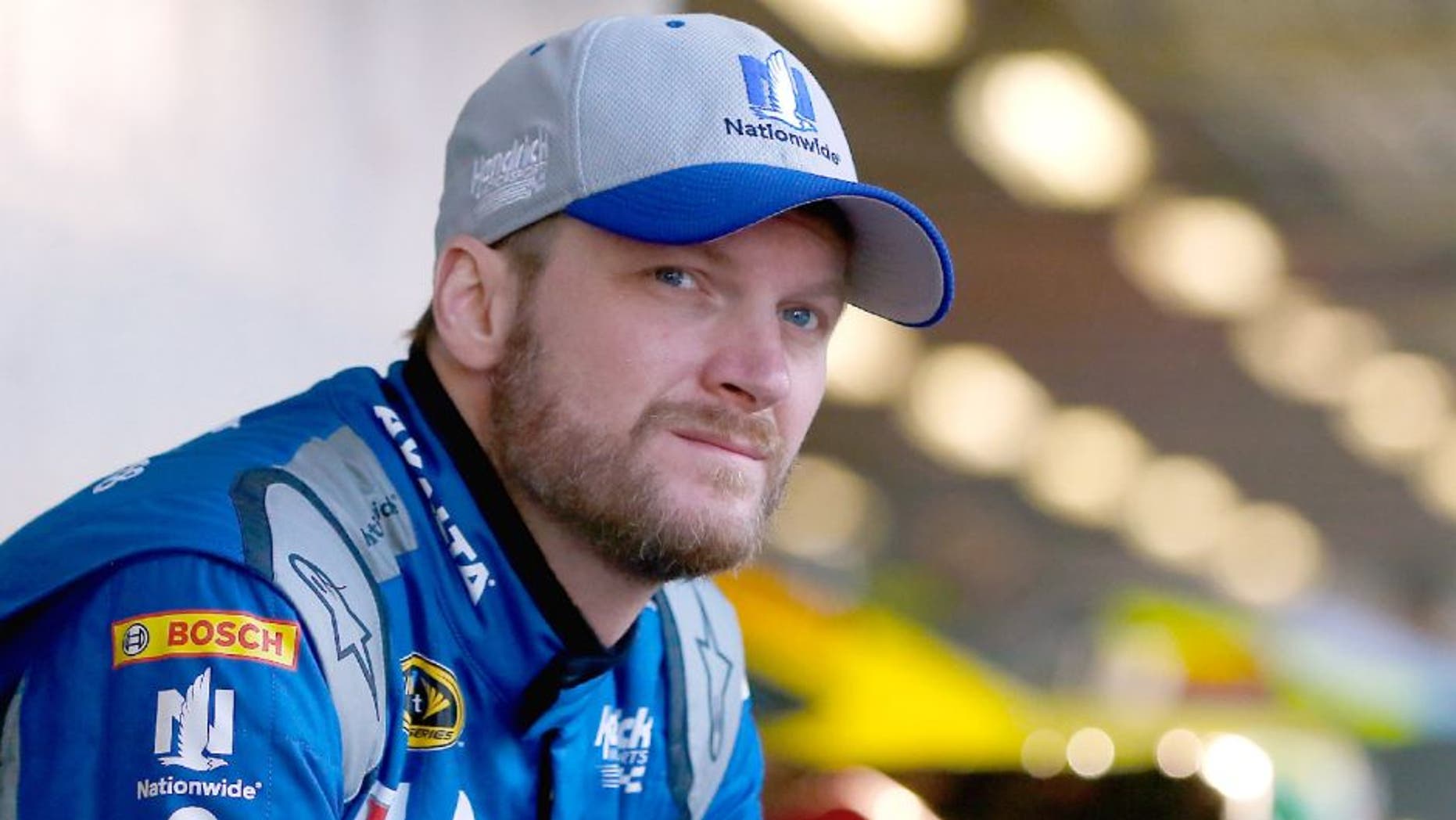 DAYTONA BEACH, FL - FEBRUARY 17: Dale Earnhardt Jr., driver of the #88 Nationwide Chevrolet, stands in the garage area during practice for the Daytona 500 at Daytona International Speedway on February 17, 2016 in Daytona Beach, Florida. (Photo by Jonathan Ferrey/Getty Images)