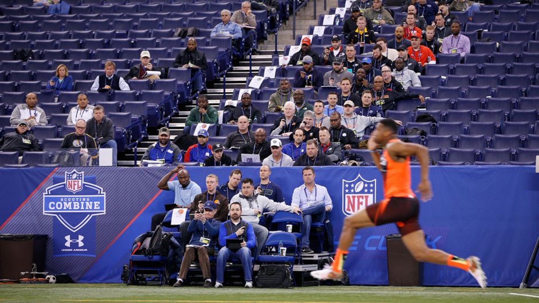 INDIANAPOLIS, IN - FEBRUARY 21: General view as NFL team personnel watch quarterback Jameis Winston of Florida State run the 40-yard dash during the 2015 NFL Scouting Combine at Lucas Oil Stadium on February 21, 2015 in Indianapolis, Indiana. (Photo by Joe Robbins/Getty Images)