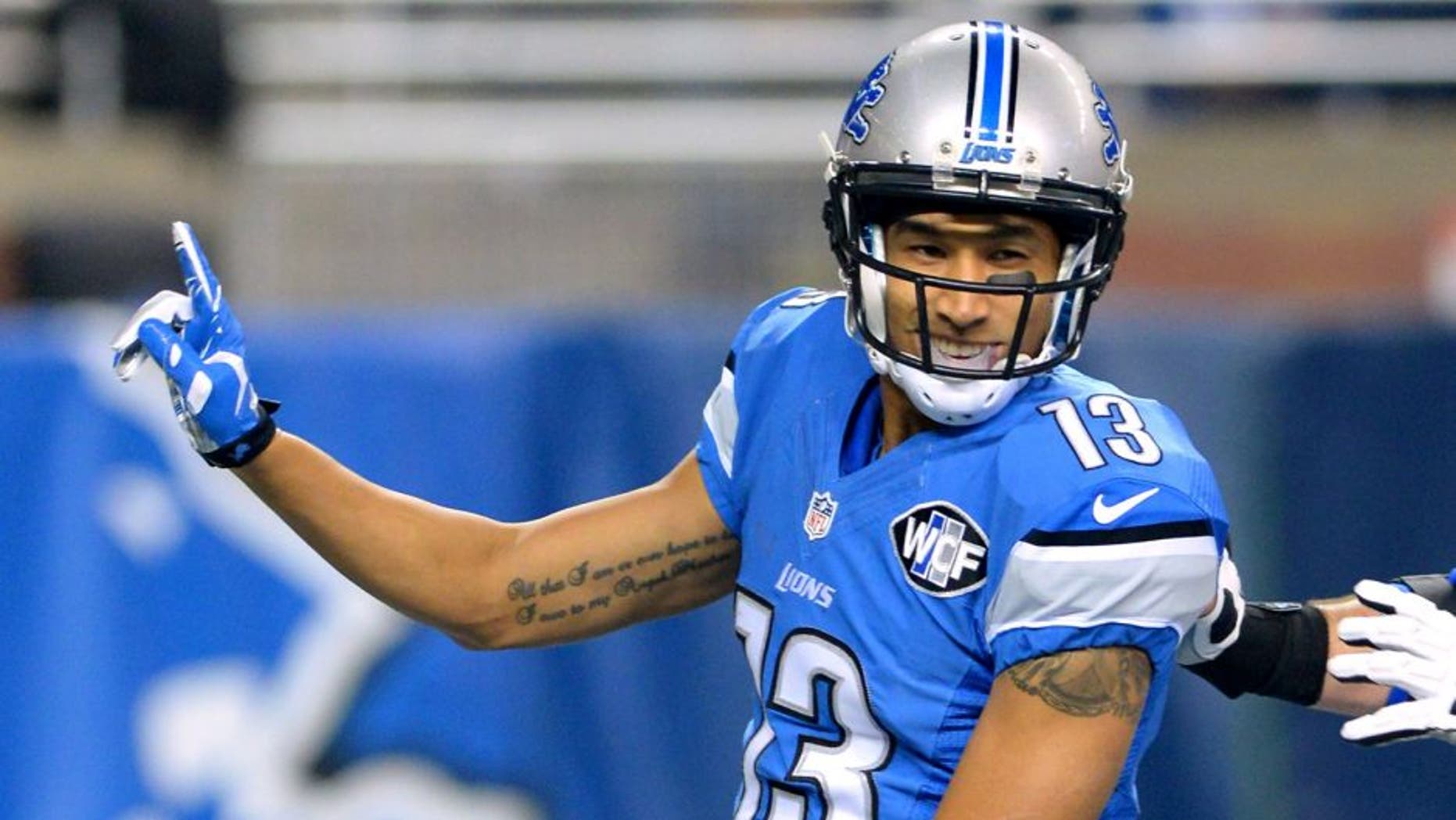 DETROIT, MI - DECEMBER 27: TJ Jones #13 of the Detroit Lions reacts after scoring his first NFL touchdown during the game against the San Francisco 49ers at Ford Field on December 27, 2015 in Detroit, Michigan. The Lions defeated the 49ers 32-17. (Photo by Mark Cunningham/Detroit Lions/Getty Images)