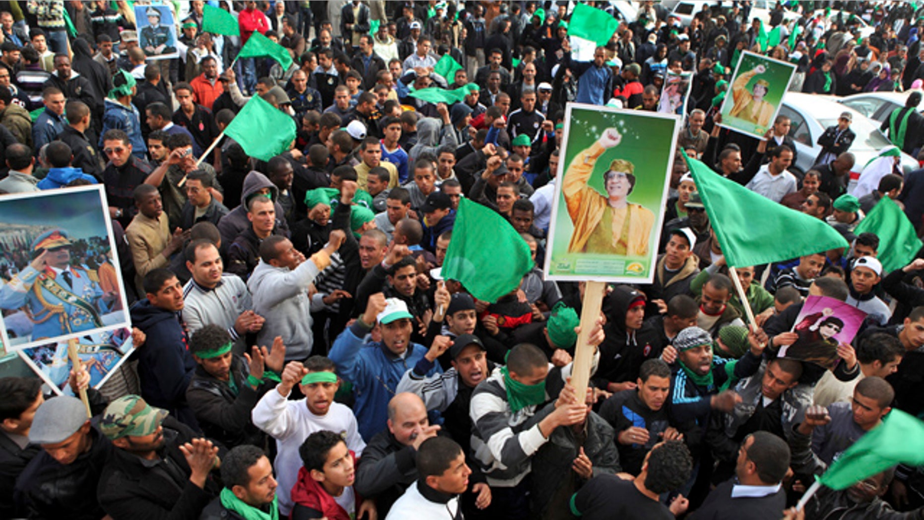 Feb. 18: Pro-Gadhafi supporters gather in Green Square after traditional Friday prayers in Tripoli, Libya.