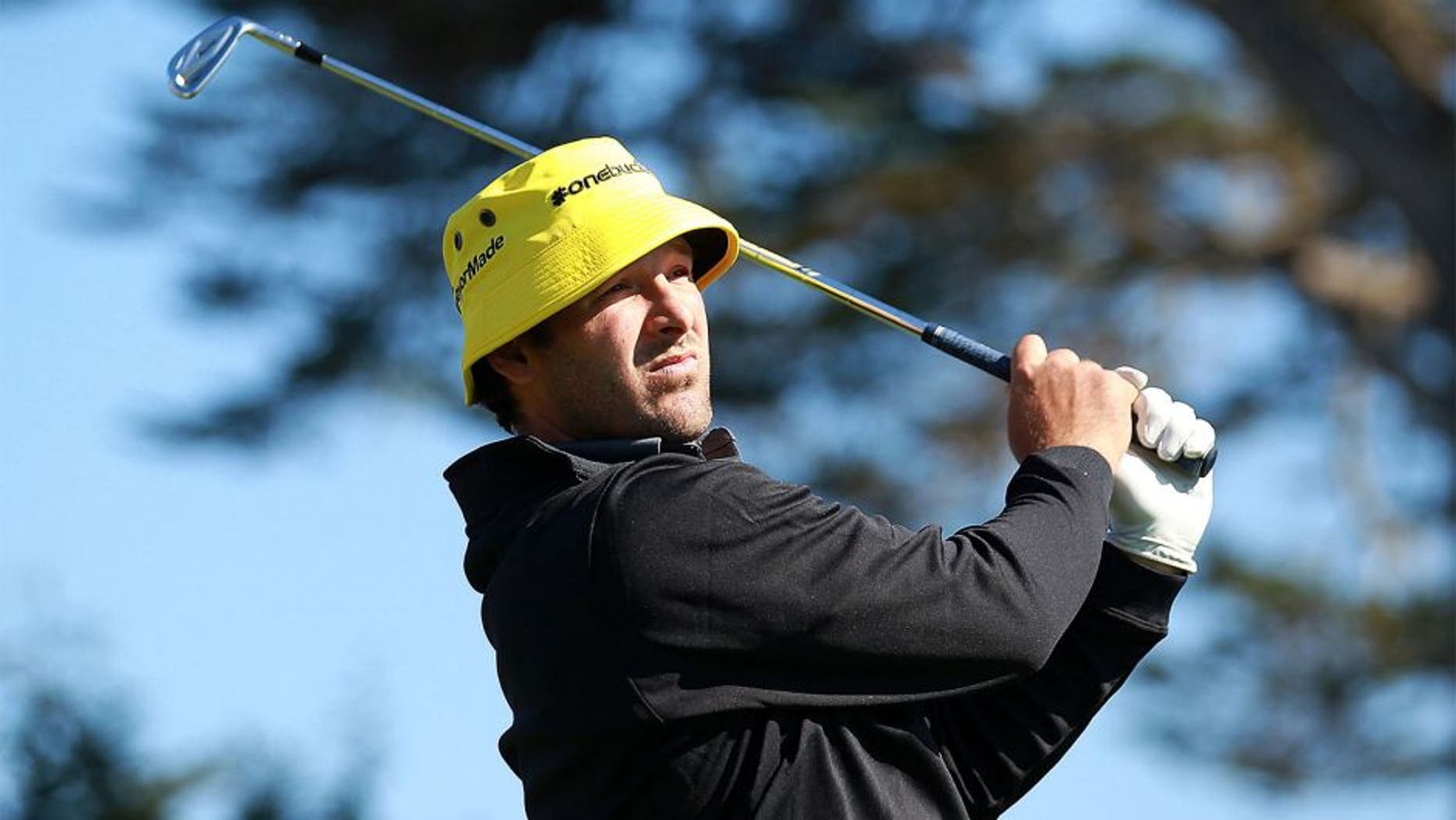 PEBBLE BEACH, CA - FEBRUARY 09: Tony Romo of the Dallas Cowboys watches his tee shot on the 17th hole during the third round of the AT&T Pebble Beach National Pro-Am at Pebble Beach Golf Links on February 9, 2013 in Pebble Beach, California. (Photo by Jed Jacobsohn/Getty Images)
