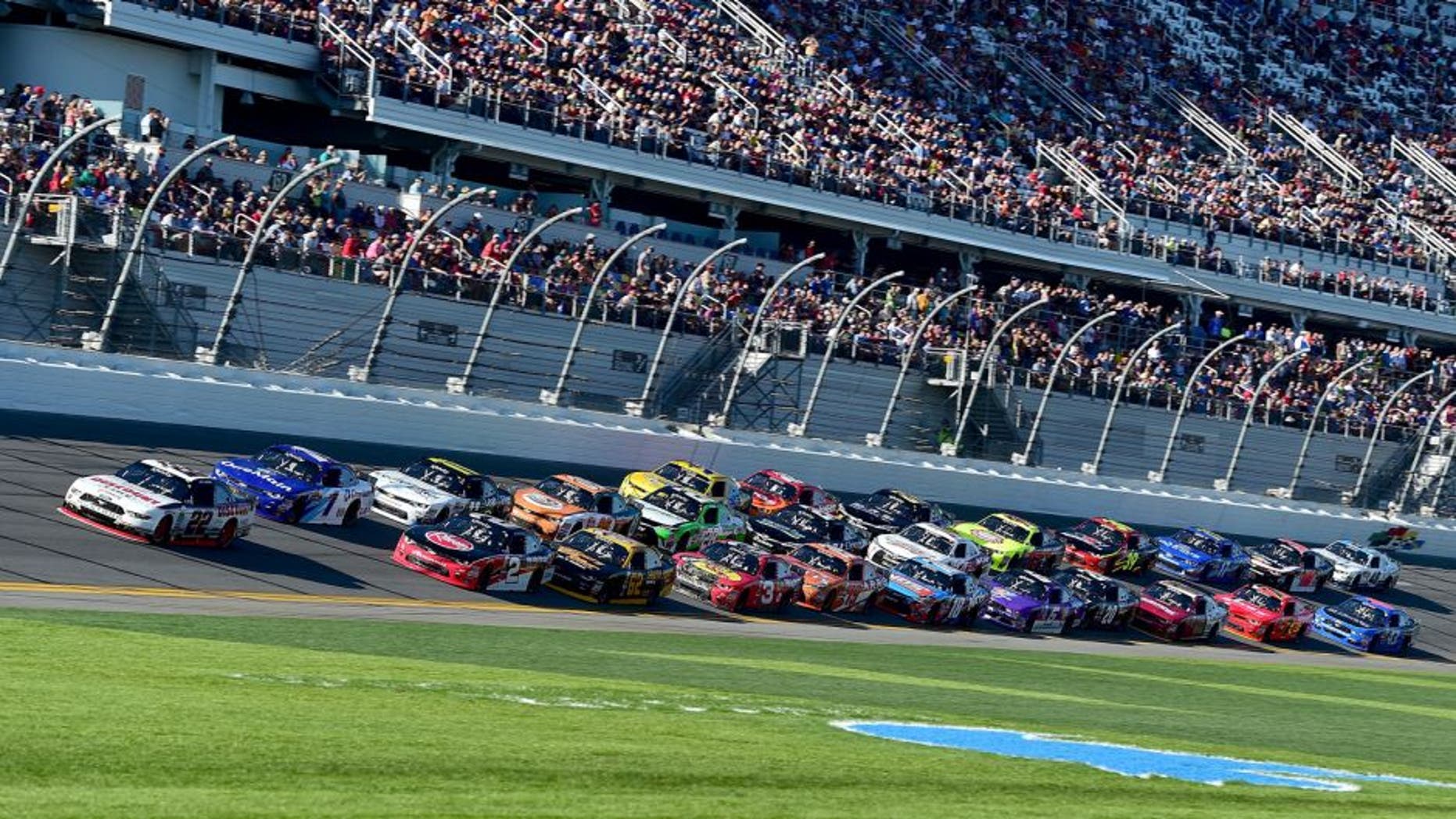 DAYTONA BEACH, FL - FEBRUARY 20: Joey Logano, driver of the #22 Discount Tire Ford, leads a pack of cars during the NASCAR XFINITY Series PowerShares QQQ 300 at Daytona International Speedway on February 20, 2016 in Daytona Beach, Florida. (Photo by Jared C. Tilton/Getty Images)