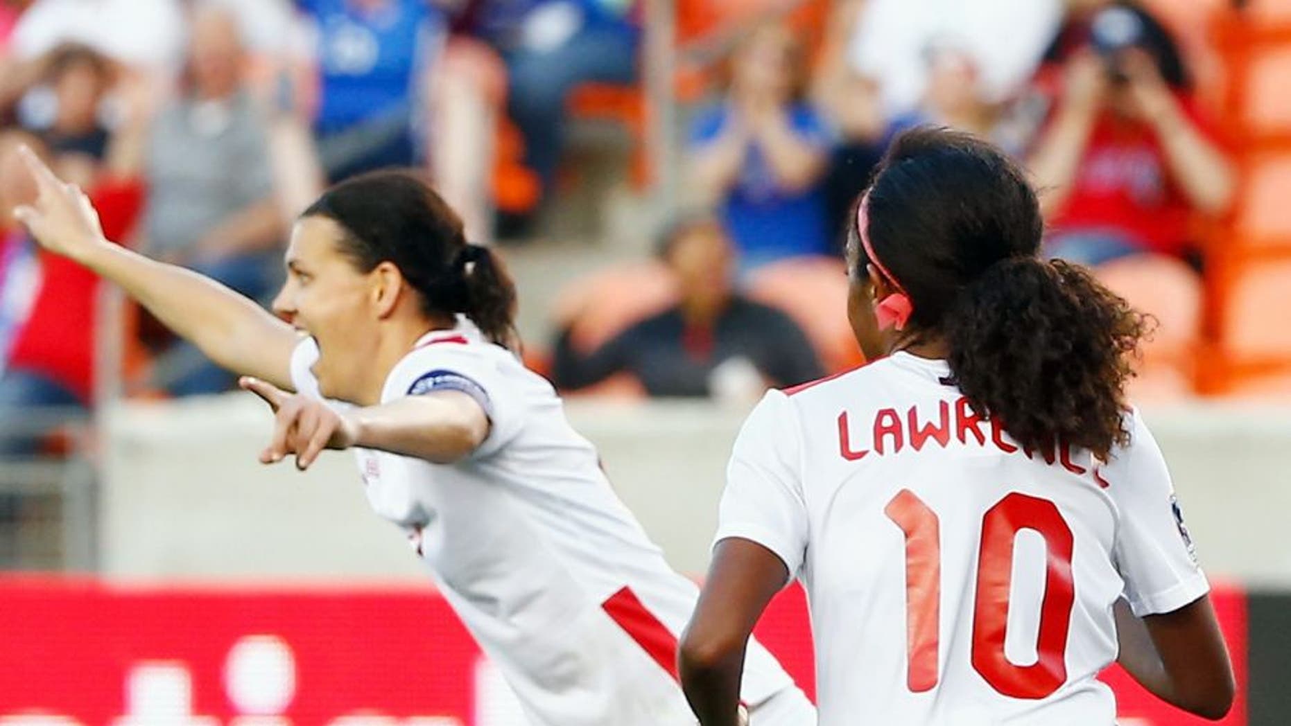 HOUSTON, TX - FEBRUARY 19: Christine Sinclair #12 of Canada celebrates after scoring a second half goal against Costa Rica during the Semifinal of the 2016 CONCACAF Women's Olympic Qualifying at BBVA Compass Stadium on February 19, 2016 in Houston, Texas. (Photo by Scott Halleran/Getty Images)