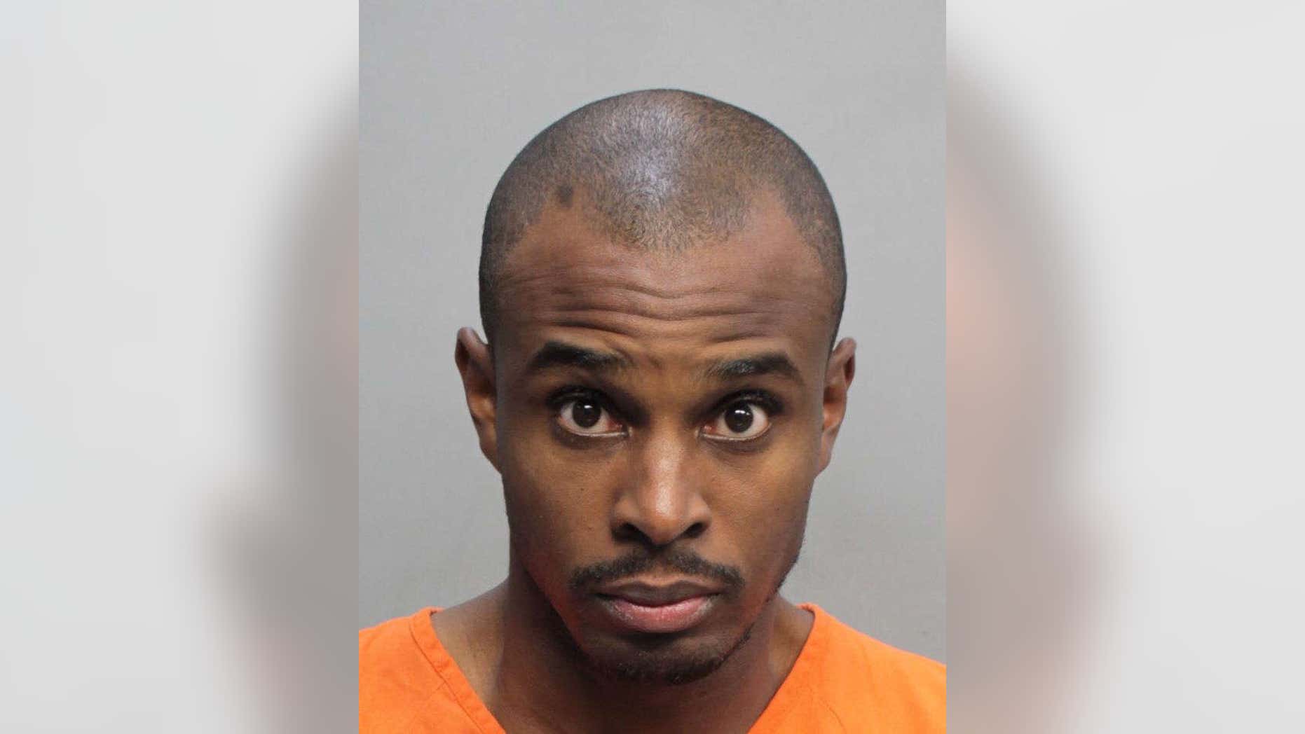 This photo provided by Miami-Dade Corrections Department shows Byron Mitchell.
