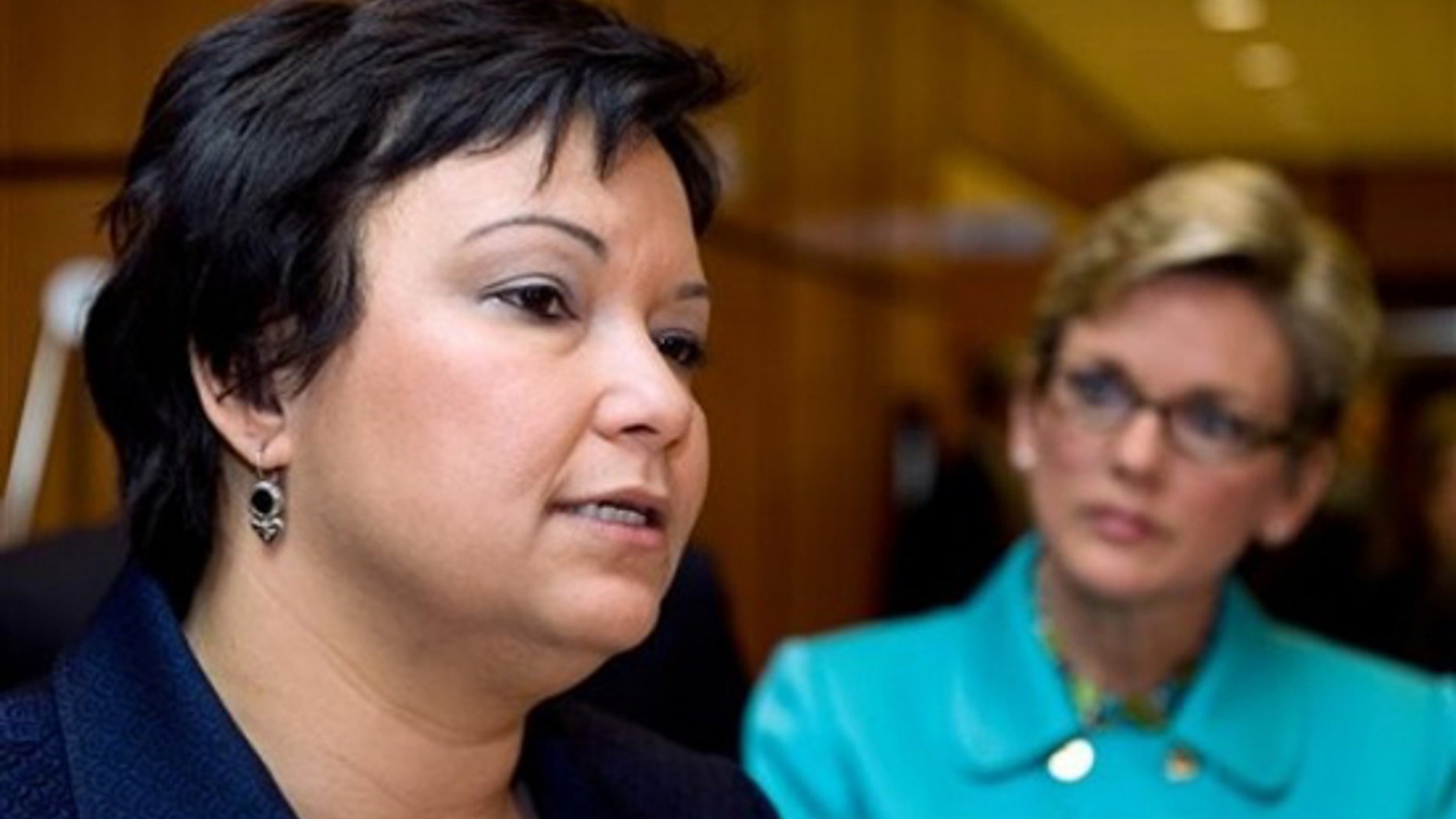 EPA Administrator Lisa Jackson, left, makes a statement to unveil President Barack Obama's Great Lakes Restoration Initiative Action Plan as Michigan Gov. Jennifer Granholm looks on following a meeting of the Council of Great Lakes Governors in Washington, Sunday, Feb. 21, 2010. (AP)
