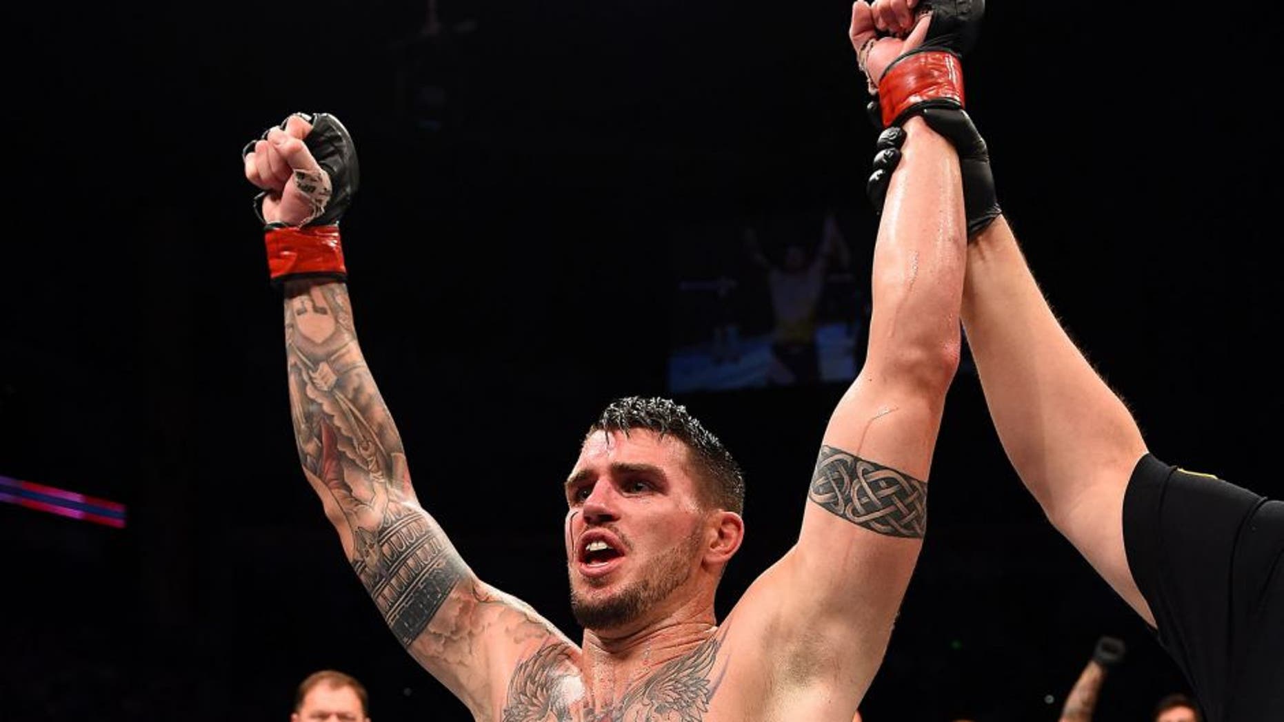 NASHVILLE, TN - AUGUST 08: Chris Camozzi celebrates after defeating Tom Watson of England in their middleweight bout during the UFC Fight Night event at Bridgestone Arena on August 8, 2015 in Nashville, Tennessee. (Photo by Josh Hedges/Zuffa LLC/Zuffa LLC via Getty Images)