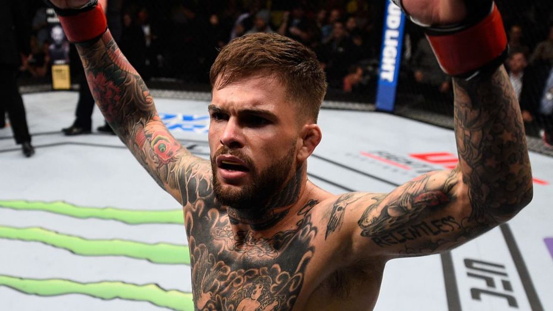 PITTSBURGH, PA - FEBRUARY 21: Cody Garbrandt celebrates his knockout victory over Augusto Mendes in their bantamweight bout during the UFC Fight Night event at Consol Energy Center on February 21, 2016 in Pittsburgh, Pennsylvania. (Photo by Jeff Bottari/Zuffa LLC/Zuffa LLC via Getty Images)