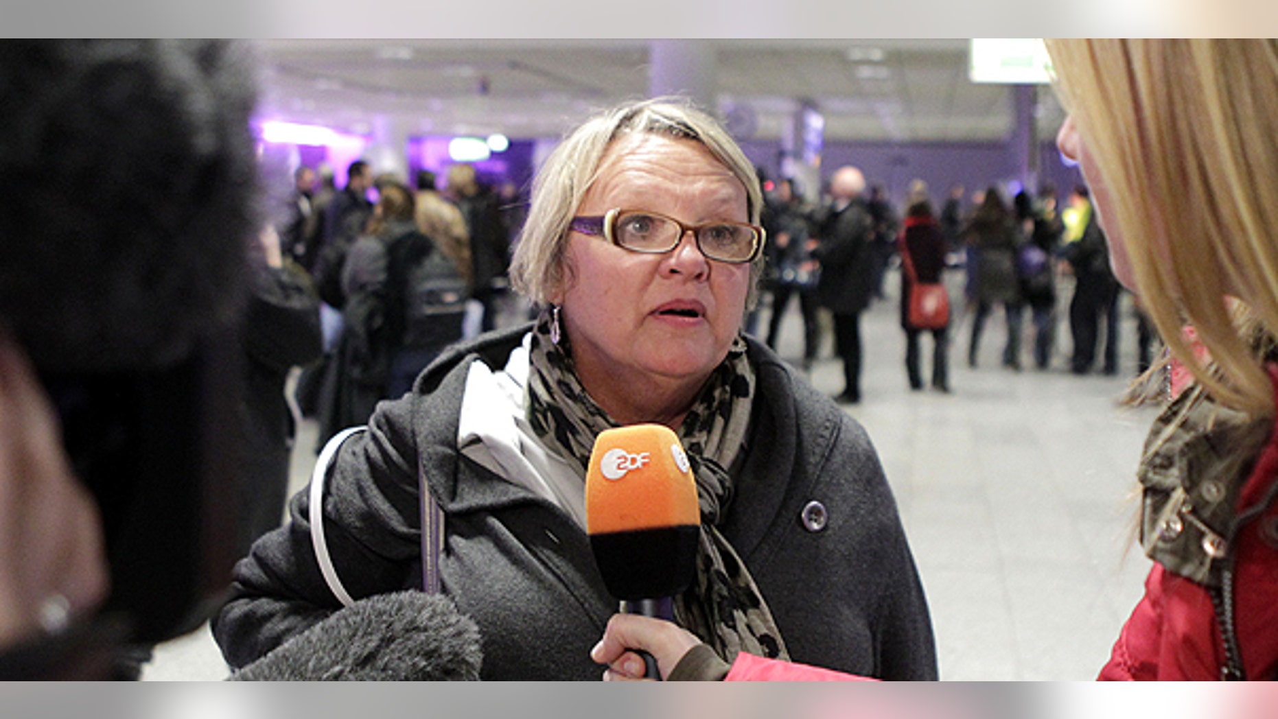 Feb. 22: Didi Blackburn from Dallas, Texas, talks to the media at the airport in Frankfurt, central Germany, after she was flown out of Tripoli, Libya.