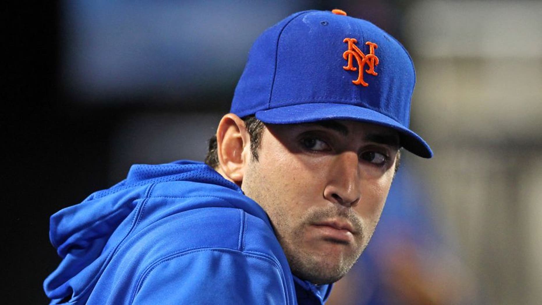 Sep 9, 2013; New York, NY, USA; New York Mets injured starting pitcher Matt Harvey (33) looks on from the dugout during the sixth inning of a game against the Washington Nationals at Citi Field. Mandatory Credit: Brad Penner-USA TODAY Sports