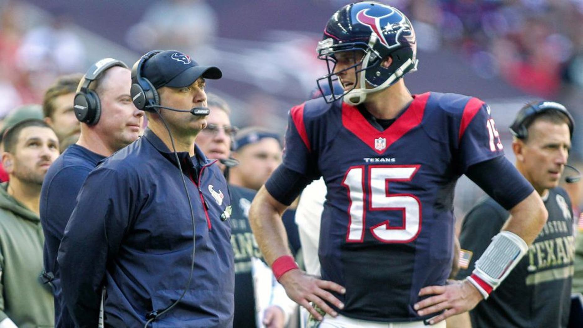 Nov 23, 2014; Houston, TX, USA; Houston Texans head coach Bill O'Brien and quarterback Ryan Mallett (15) on the sideline during the third quarter against the Cincinnati Bengals at NRG Stadium. The Bengals defeated the Texans 22-13. Mandatory Credit: Troy Taormina-USA TODAY Sports