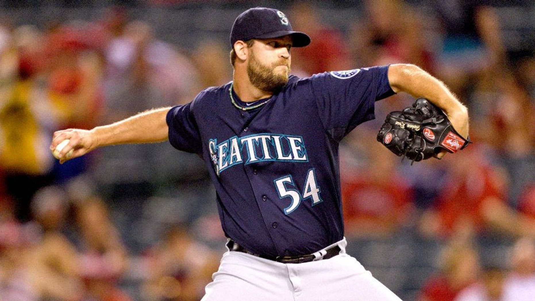ANAHEIM, CA - SEPTEMBER 16: Tom Wilhelmsen #54 of the Seattle Mariners pitches during the game against the Los Angeles Angels of Anaheim on September 16, 2014 at Angel Stadium of Anaheim in Anaheim, California. (Photo by Matt Brown/Angels Baseball LP/Getty Images)