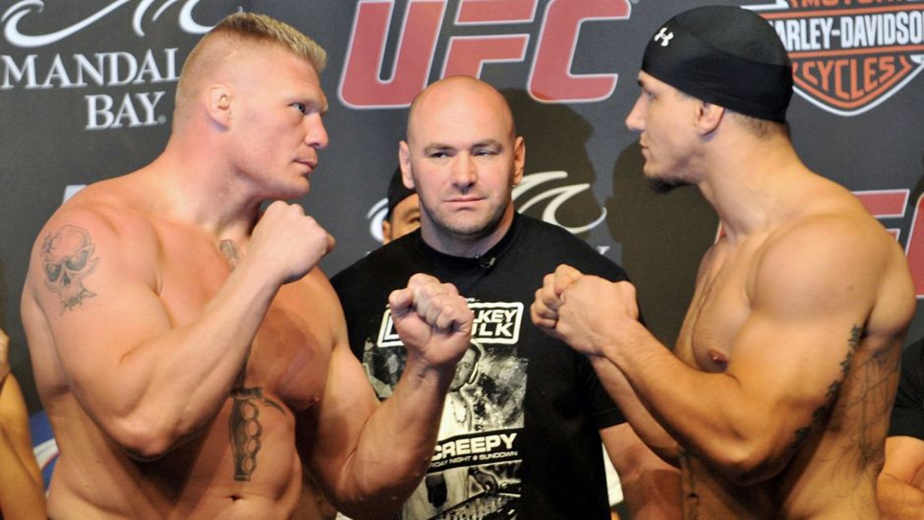 LAS VEGAS - JULY 10: UFC heavyweight fighters Brock Lesnar (L) and Frank Mir (R) square off at UFC 100 Weigh-Ins at the Mandalay Bay Hotel and Casino on July 10, 2009 in Las Vegas, Nevada. (Photo by Jon Kopaloff/Getty Images)