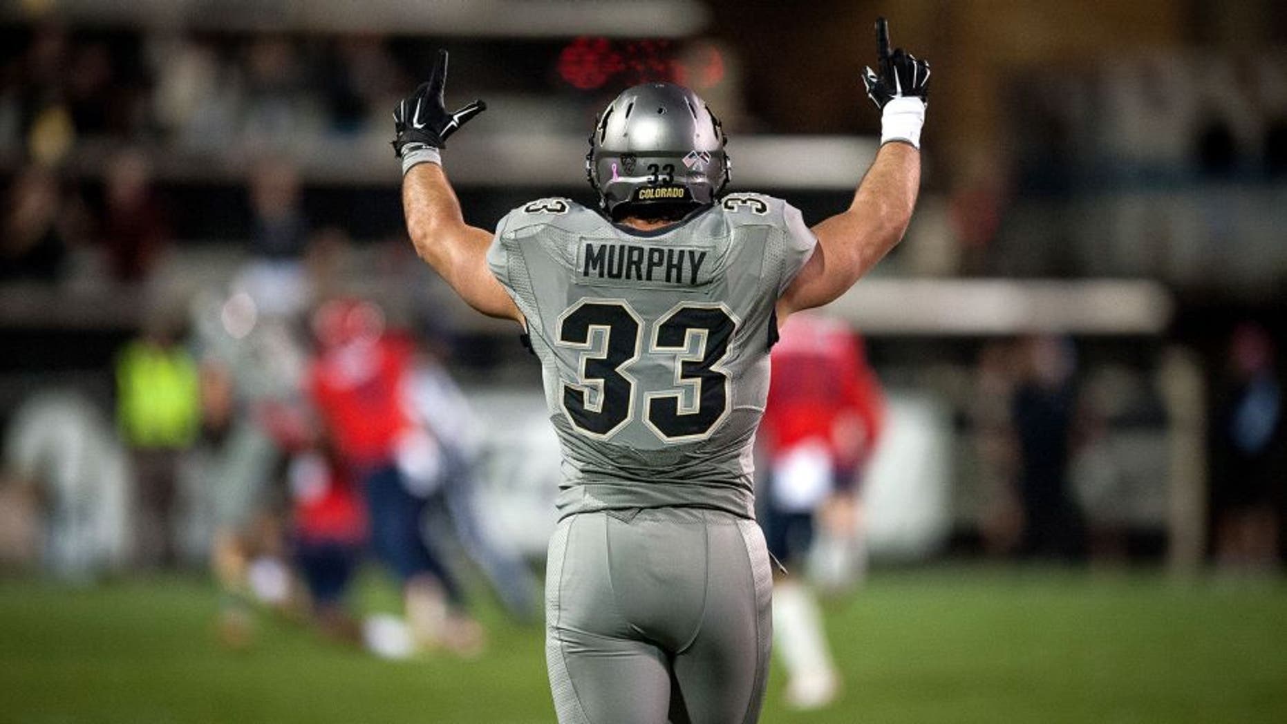 BOULDER, CO - OCTOBER 17: Fullback Jordan Murphy #33 of the Colorado Buffaloes celebrates after a nice play against the Arizona Wildcats at Folsom Field on October 17, 2015 in Boulder, Colorado. (Photo by Dustin Bradford/Getty Images)