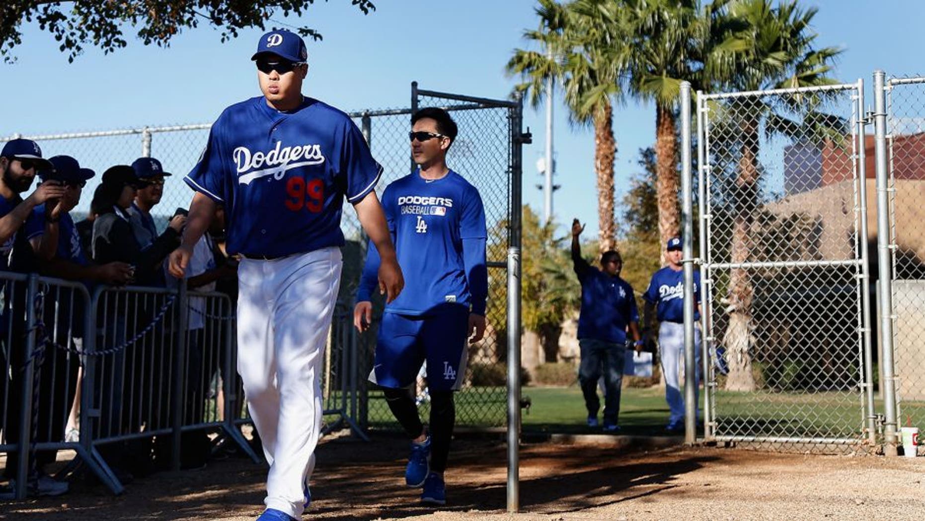 GLENDALE, AZ - FEBRUARY 20: Starting pitcher Hyun-Jin Ryu #99 of the Los Angeles Dodgers arrives to a spring training workout at Camelback Ranch on February 20, 2016 in Glendale, Arizona. (Photo by Christian Petersen/Getty Images)