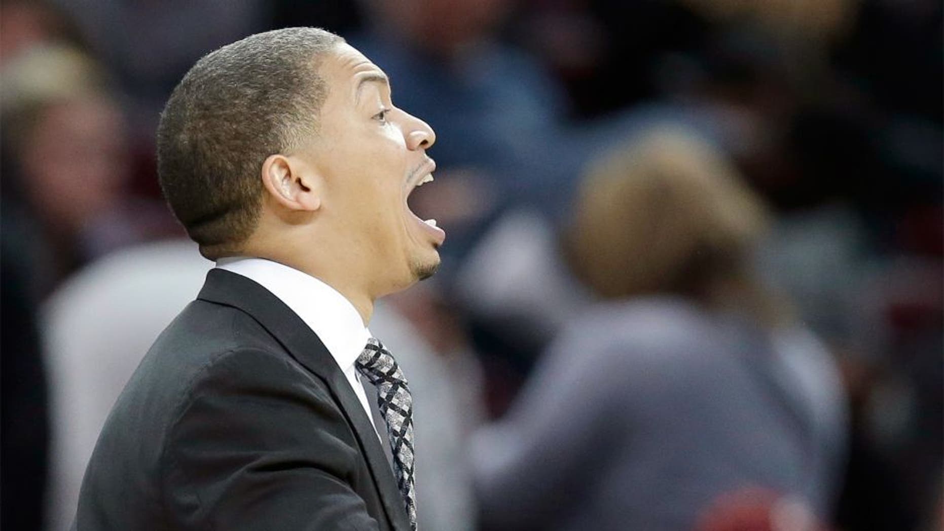 Cleveland Cavaliers head coach Tyronn Lue yells to players in the second half of an NBA basketball game against the Detroit Pistons, Monday, Feb. 22, 2016, in Cleveland. The Pistons won 96-88. (AP Photo/Tony Dejak)