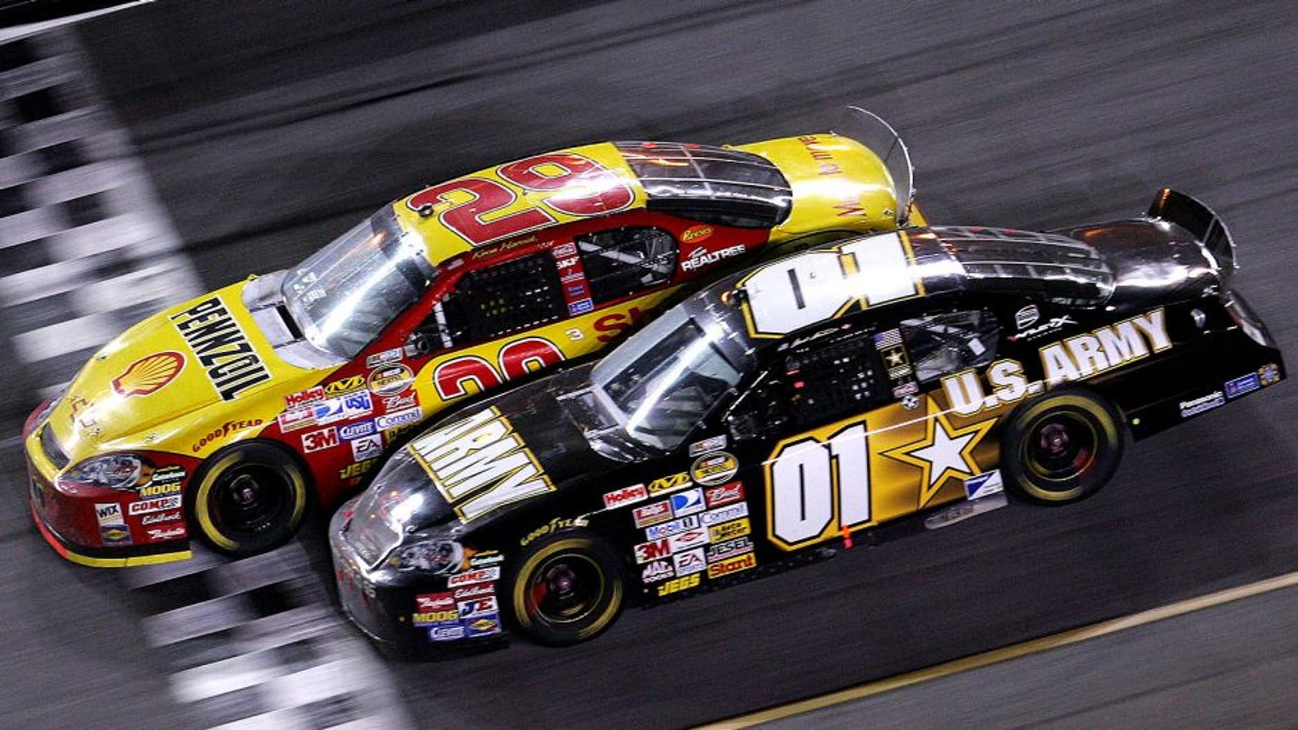 DAYTONA, FL - FEBRUARY 18: Kevin Harvick, driver of the #29 Shell/Pennzoil Chevrolet, leads Mark Martin, driver of the #01 U.S. ARMY Chevrolet, to the finish line to win the NASCAR Nextel Cup Series Daytona 500 at Daytona International Speedway on February 18, 2007 in Daytona, Florida. (Photo by Jonathan Ferrey/Getty Images for NASCAR) *** Local Caption *** Kevin Harvick;Mark Martin