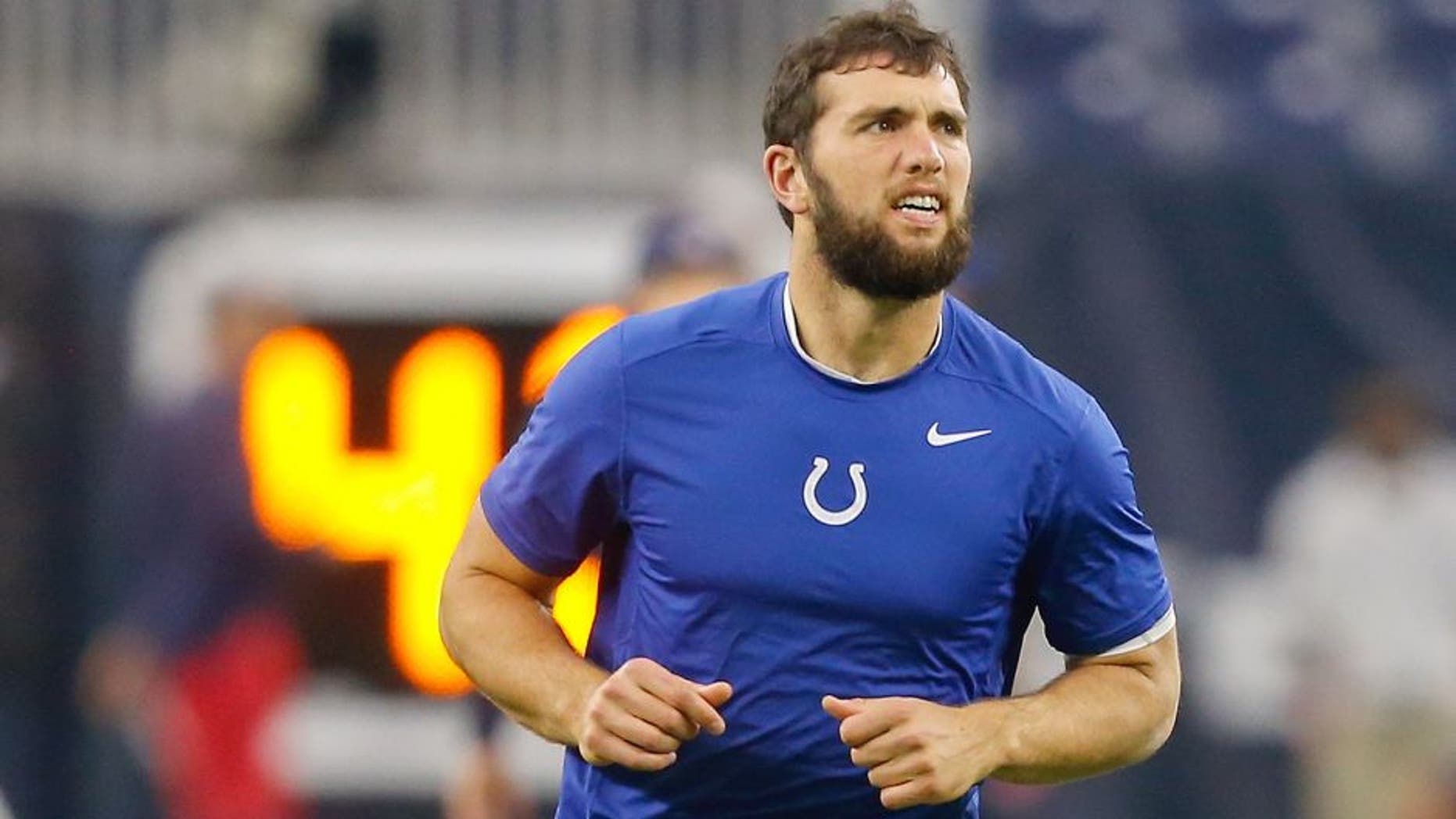 HOUSTON, TX - OCTOBER 08: Andrew Luck #12 of the Indianapolis Colts warms up before the game at NRG Stadium on October 8, 2015 in Houston, Texas. Luck did not play due to a shoulder injury. (Photo by Bob Levey/Getty Images)