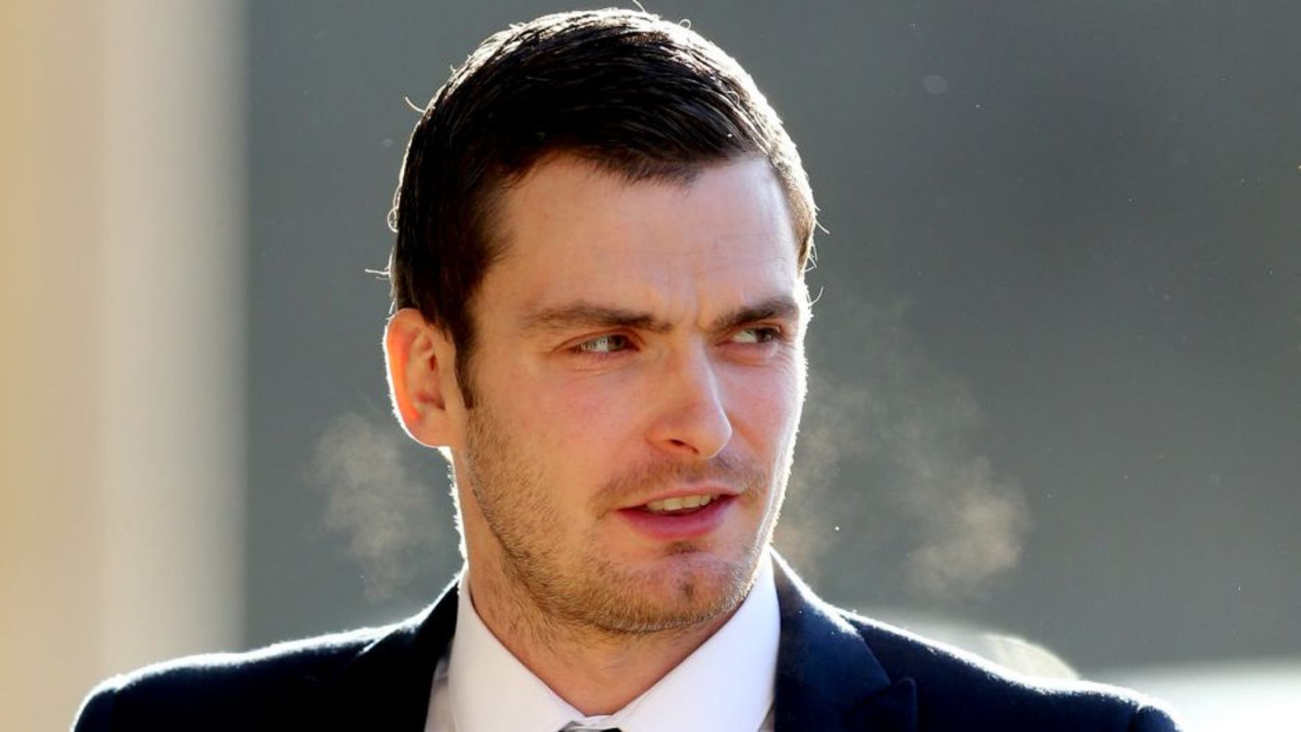 BRADFORD, ENGLAND - FEBRUARY 23: Footballer Adam Johnson arrives at Bradford Crown Court to give evidence on February 23, 2016 in Bradford, England. The former Sunderland FC midfielder, 28, from Castle Eden, County Durham, has admitted one charge of sexual activity with a child and one charge of child grooming, but denies two further counts of sexual activity with a child. (Photo by Nigel Roddis/Getty Images)