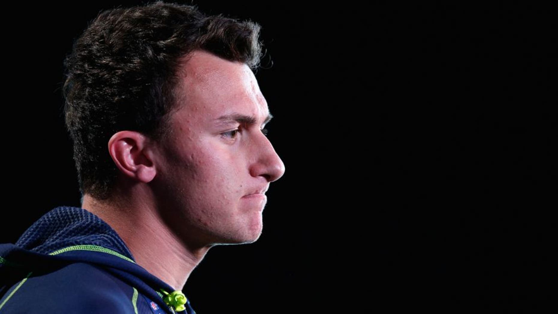 INDIANAPOLIS, IN - FEBRUARY 21: Former Texas A&M quarterback Johnny Manziel speaks to the media during the 2014 NFL Combine at Lucas Oil Stadium on February 21, 2014 in Indianapolis, Indiana. (Photo by Joe Robbins/Getty Images)