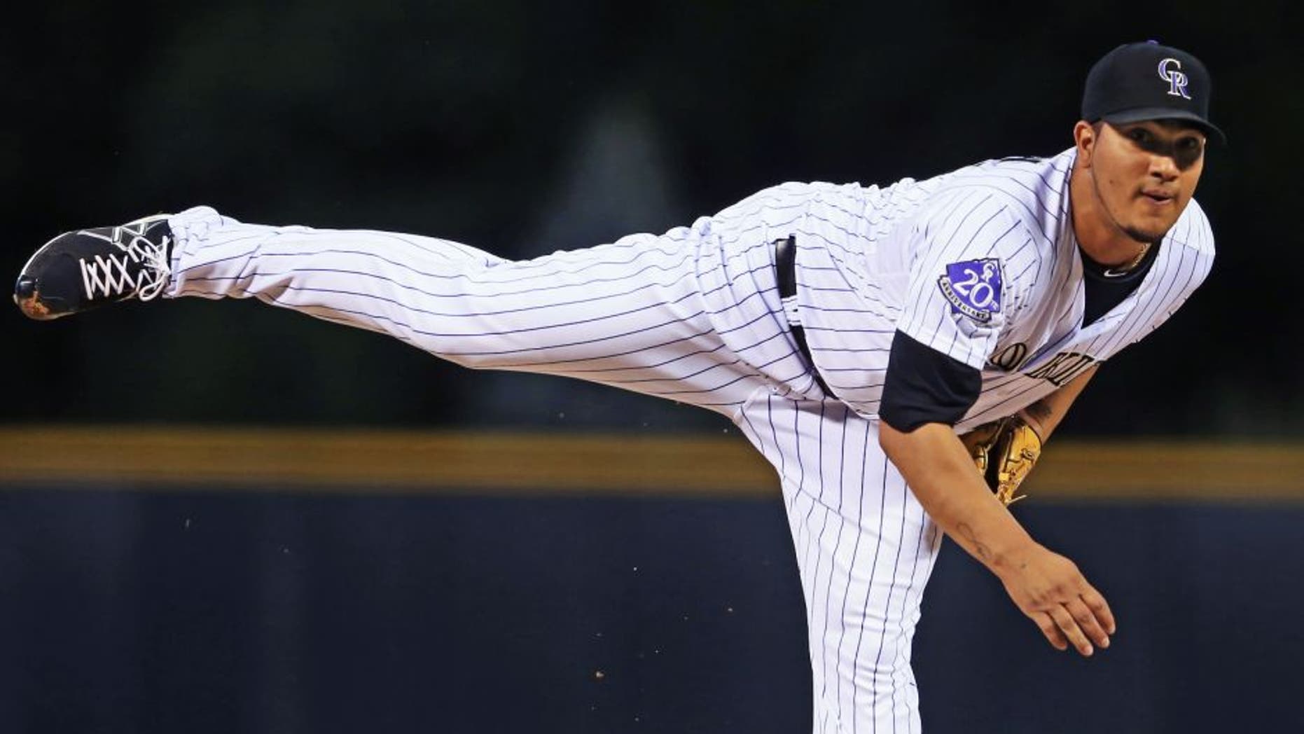 DENVER, CO - SEPTEMBER 25: Starting pitcher Jhoulys Chacin #45 of the Colorado Rockies delivers against the Boston Red Sox at Coors Field on September 25, 2013 in Denver, Colorado. (Photo by Doug Pensinger/Getty Images)