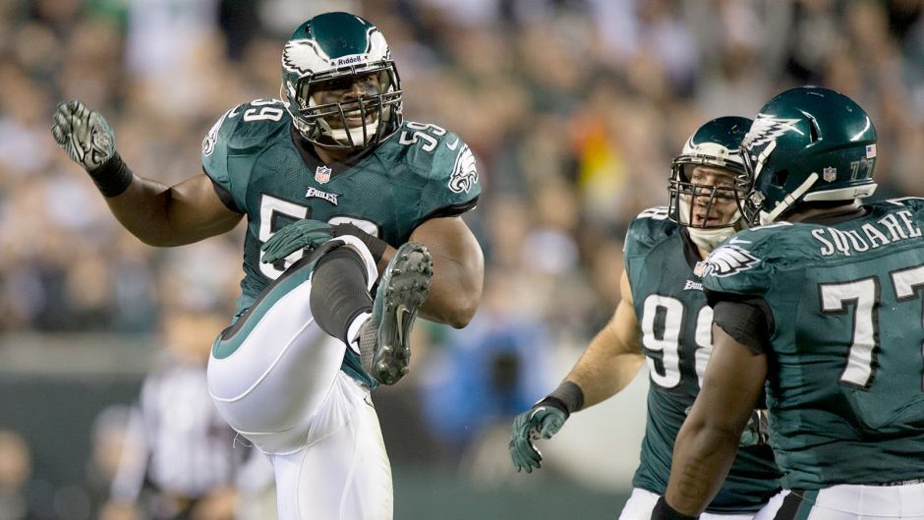 Dec 22, 2013; Philadelphia, PA, USA;Philadelphia Eagles inside linebacker DeMeco Ryans (59) celebrates after breaking up a pass during the third quarter at Lincoln Financial Field. Mandatory Credit: Tommy Gilligan-USA TODAY Sports