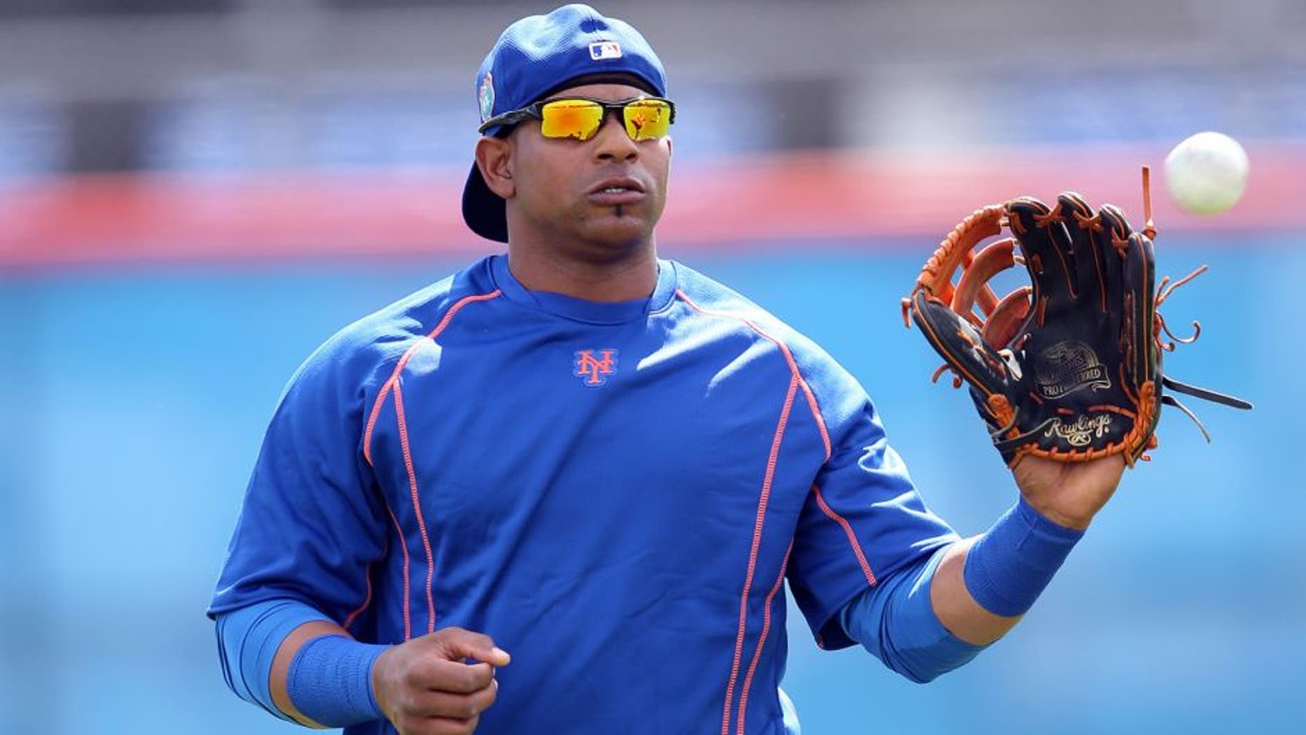 Feb 22, 2016; Port St. Lucie, FL, USA; New York Mets left fielder Yoenis Cespedes (52) warms up during spring training work out drills at Tradition Field. Mandatory Credit: Steve Mitchell-USA TODAY Sports