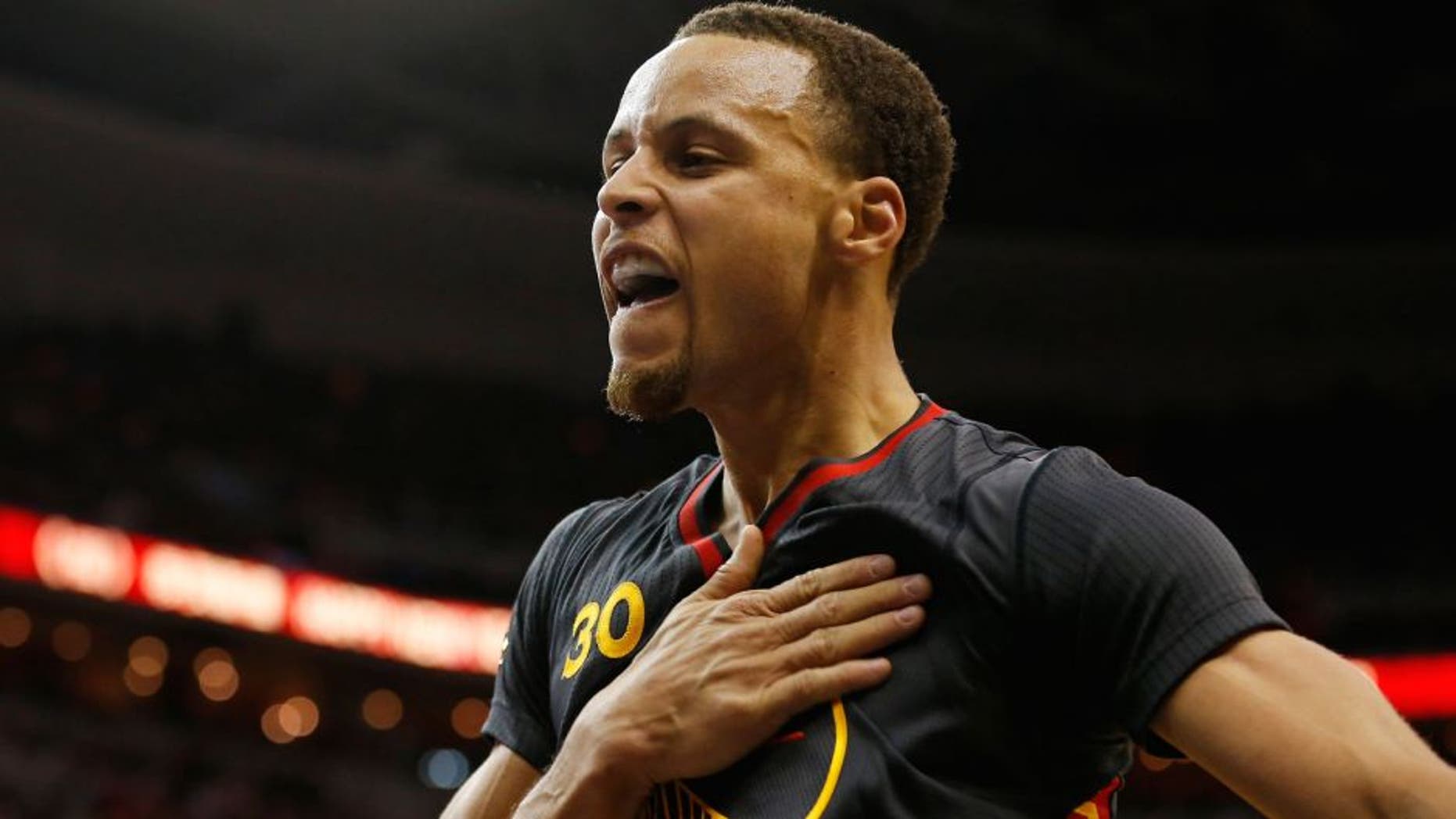 Feb 24, 2015; Washington, DC, USA; Golden State Warriors guard Stephen Curry (30) gestures on the court against the Washington Wizards in the third quarter at Verizon Center. The Warriors won 114-107. Mandatory Credit: Geoff Burke-USA TODAY Sports